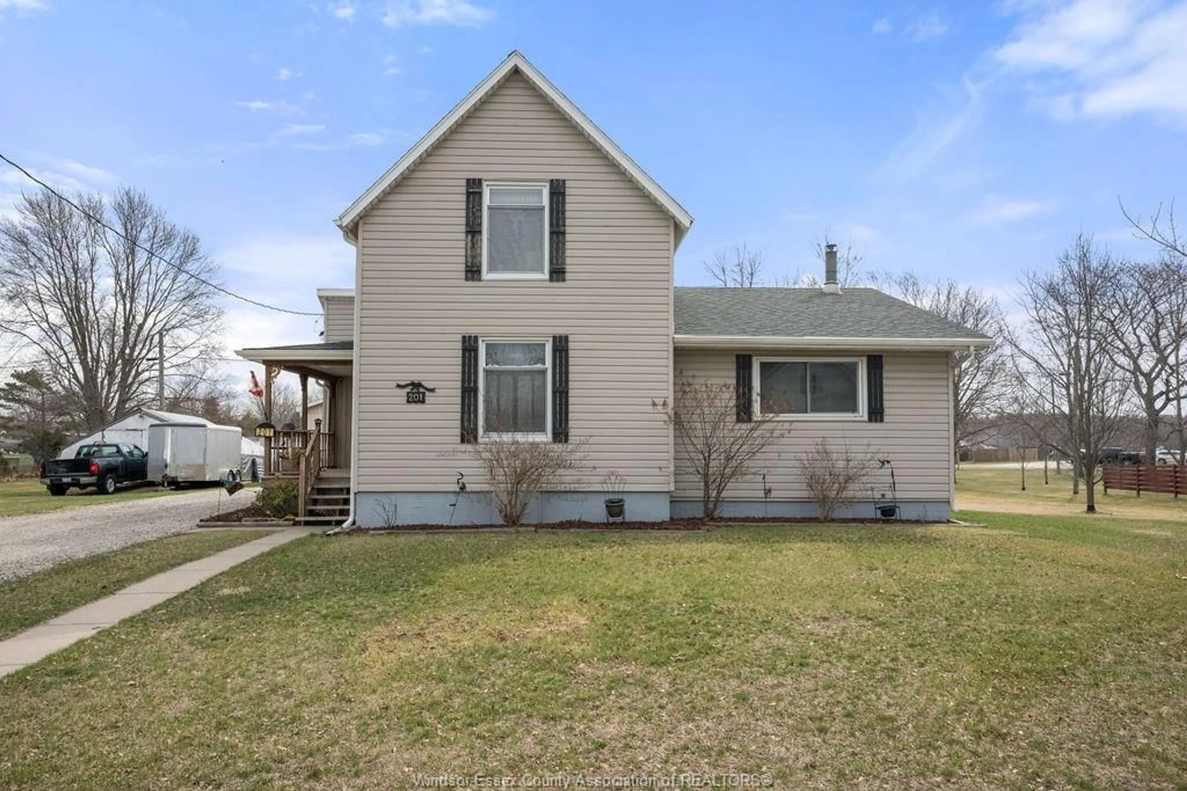 Home with vinyl exterior material, street for 201 ERIE St, Wheatley Ontario N0P 2P0