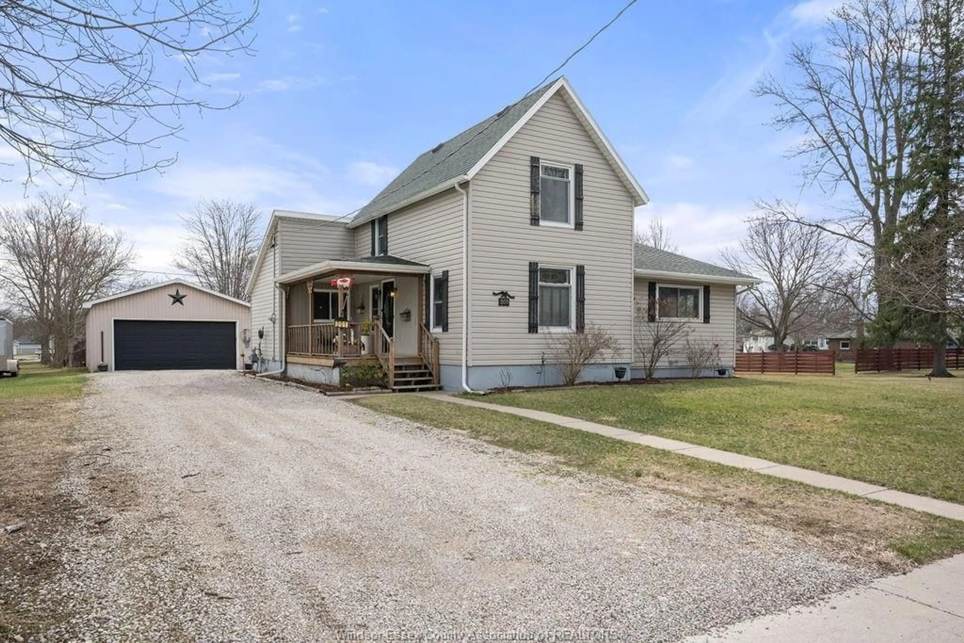 A pic from outside/outdoor area/front of a property/back of a property/a pic from drone, street for 201 ERIE St, Wheatley Ontario N0P 2P0