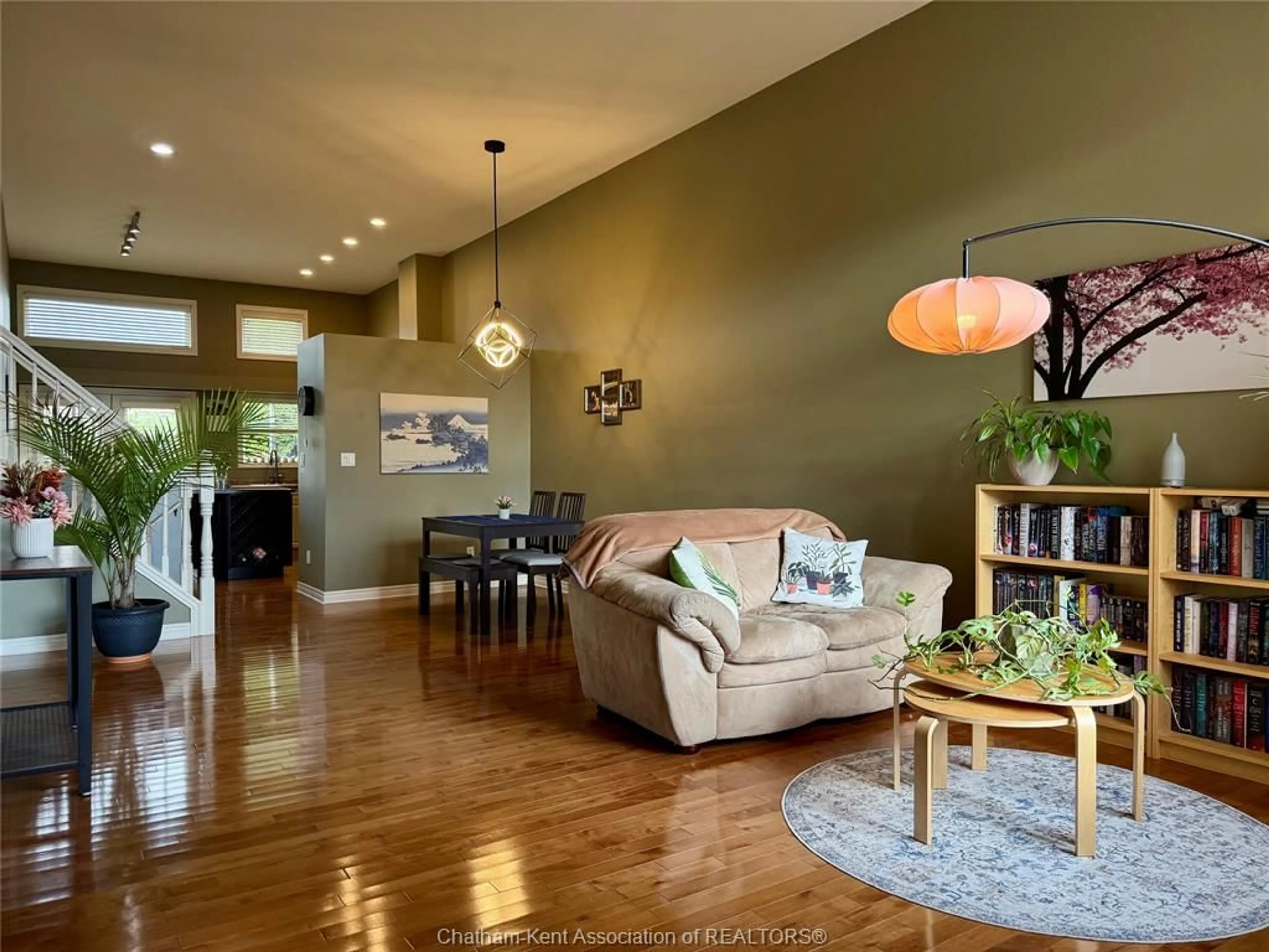 Living room with furniture, wood/laminate floor for 431 Keil Trail, Chatham Ontario N7L 5R2