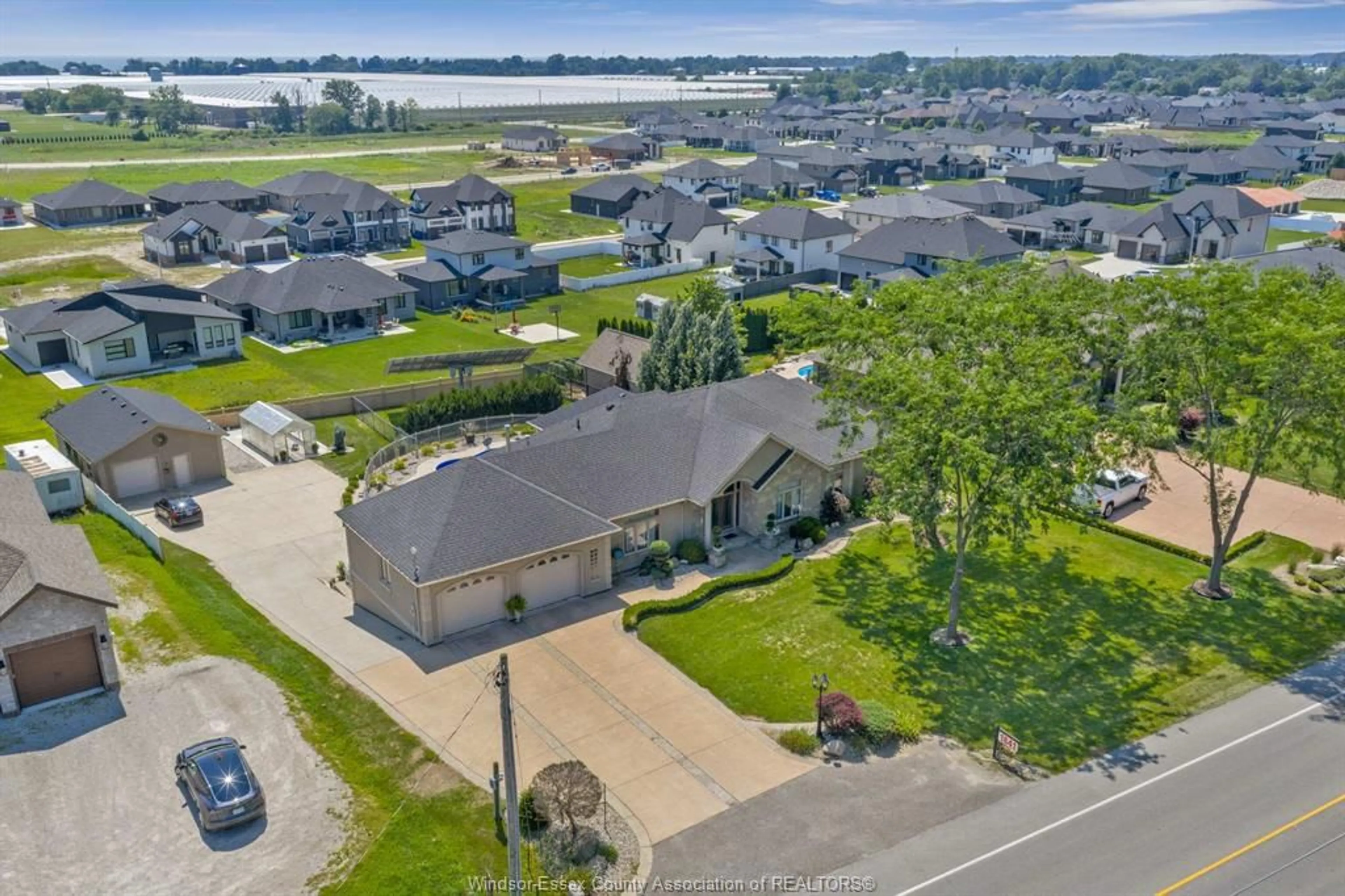 A pic from outside/outdoor area/front of a property/back of a property/a pic from drone, water/lake/river/ocean view for 1841 Talbot Rd, Kingsville Ontario N9Y 2E4