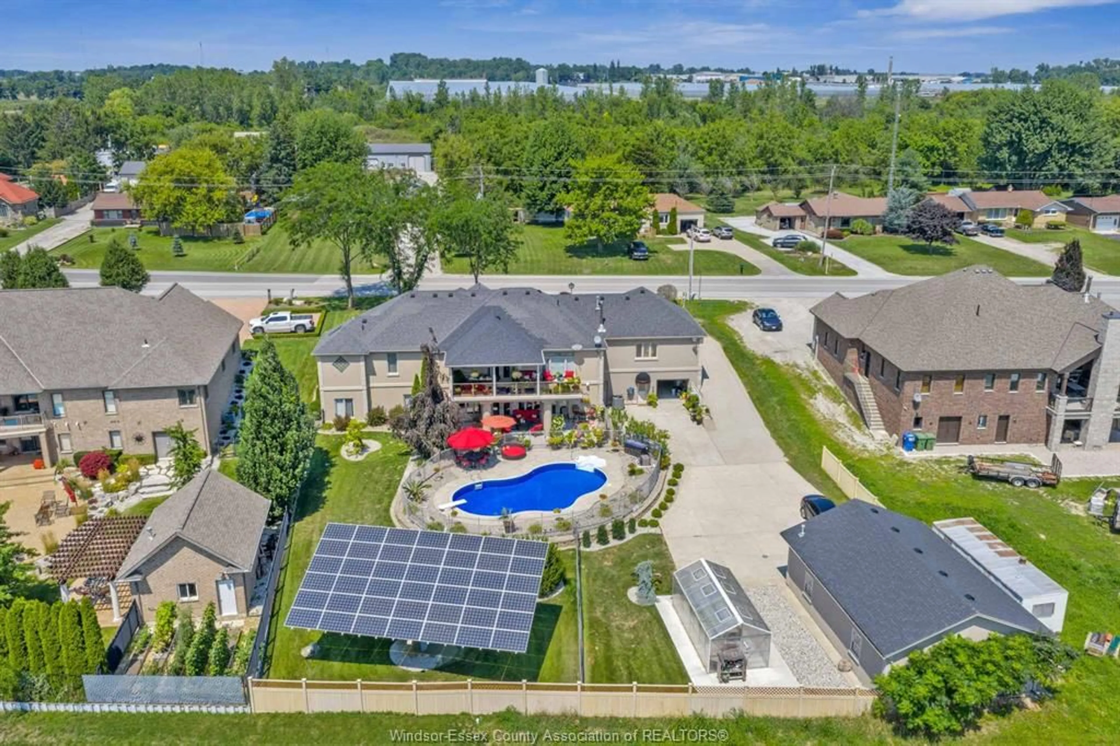 A pic from outside/outdoor area/front of a property/back of a property/a pic from drone, water/lake/river/ocean view for 1841 Talbot Rd, Kingsville Ontario N9Y 2E4