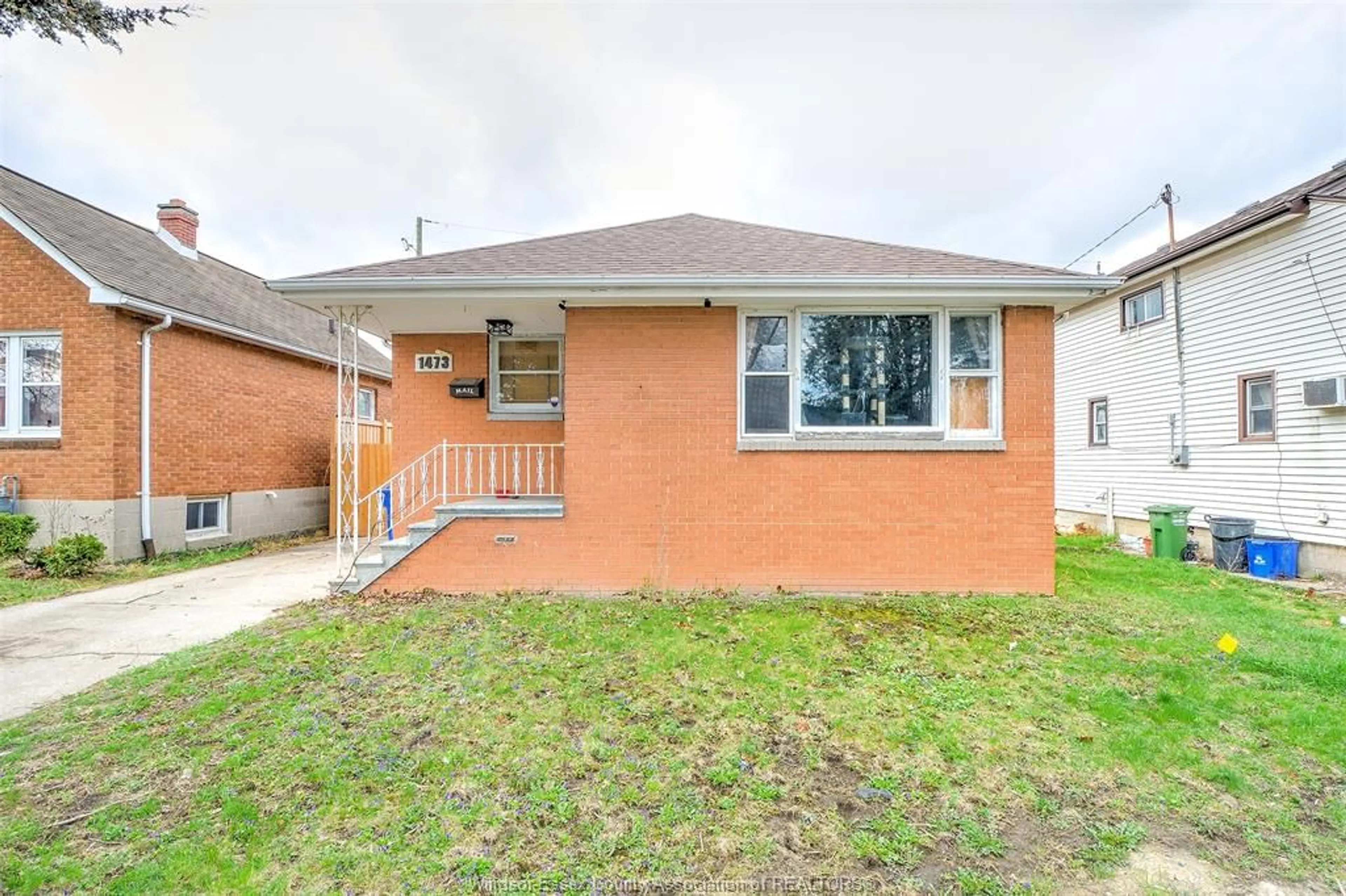 Home with brick exterior material, street for 1473 LABADIE Rd, Windsor Ontario N8Y 4H2