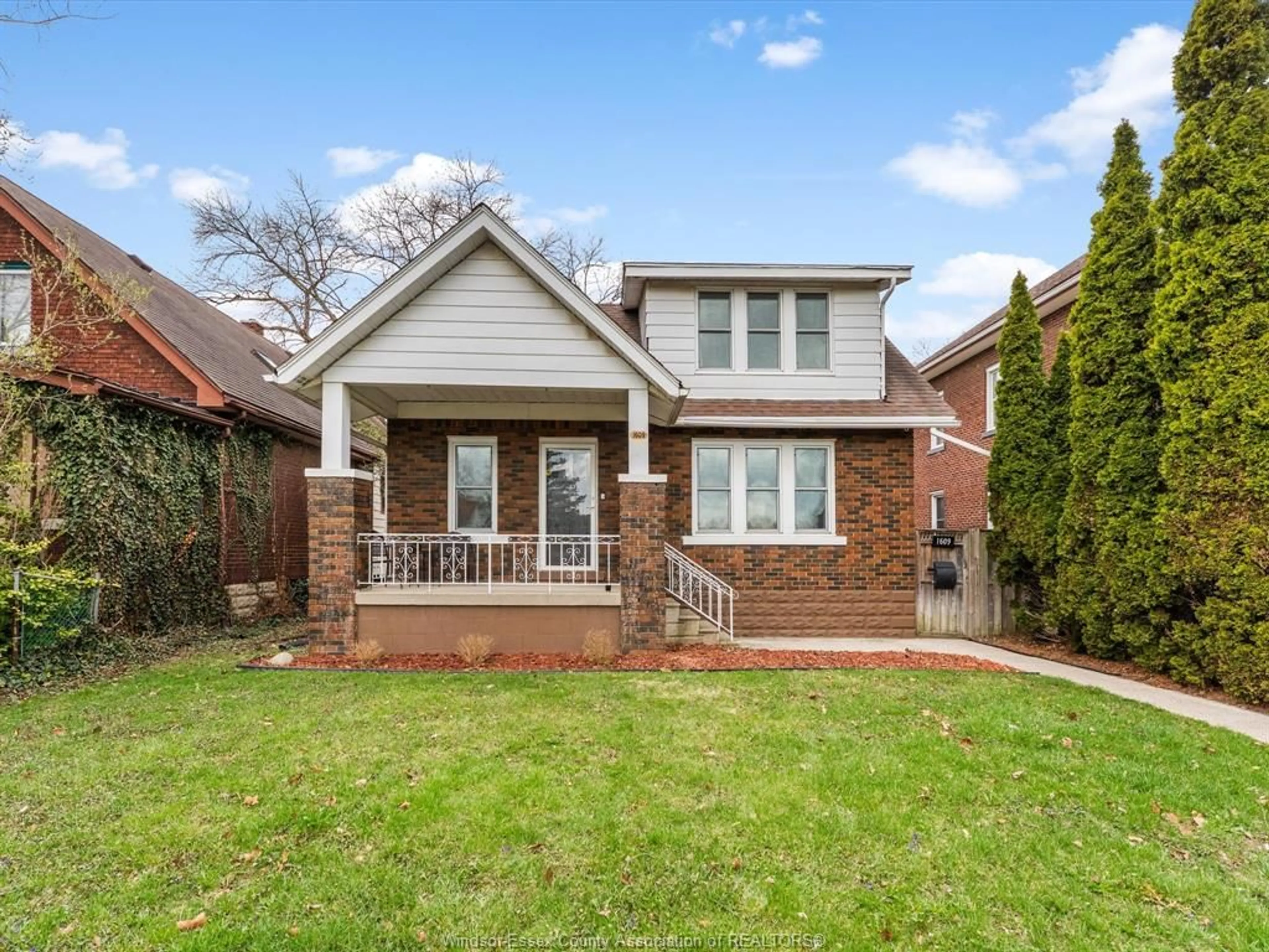 Home with brick exterior material, street for 1609 PILLETTE Rd, Windsor Ontario N8Y 3C4