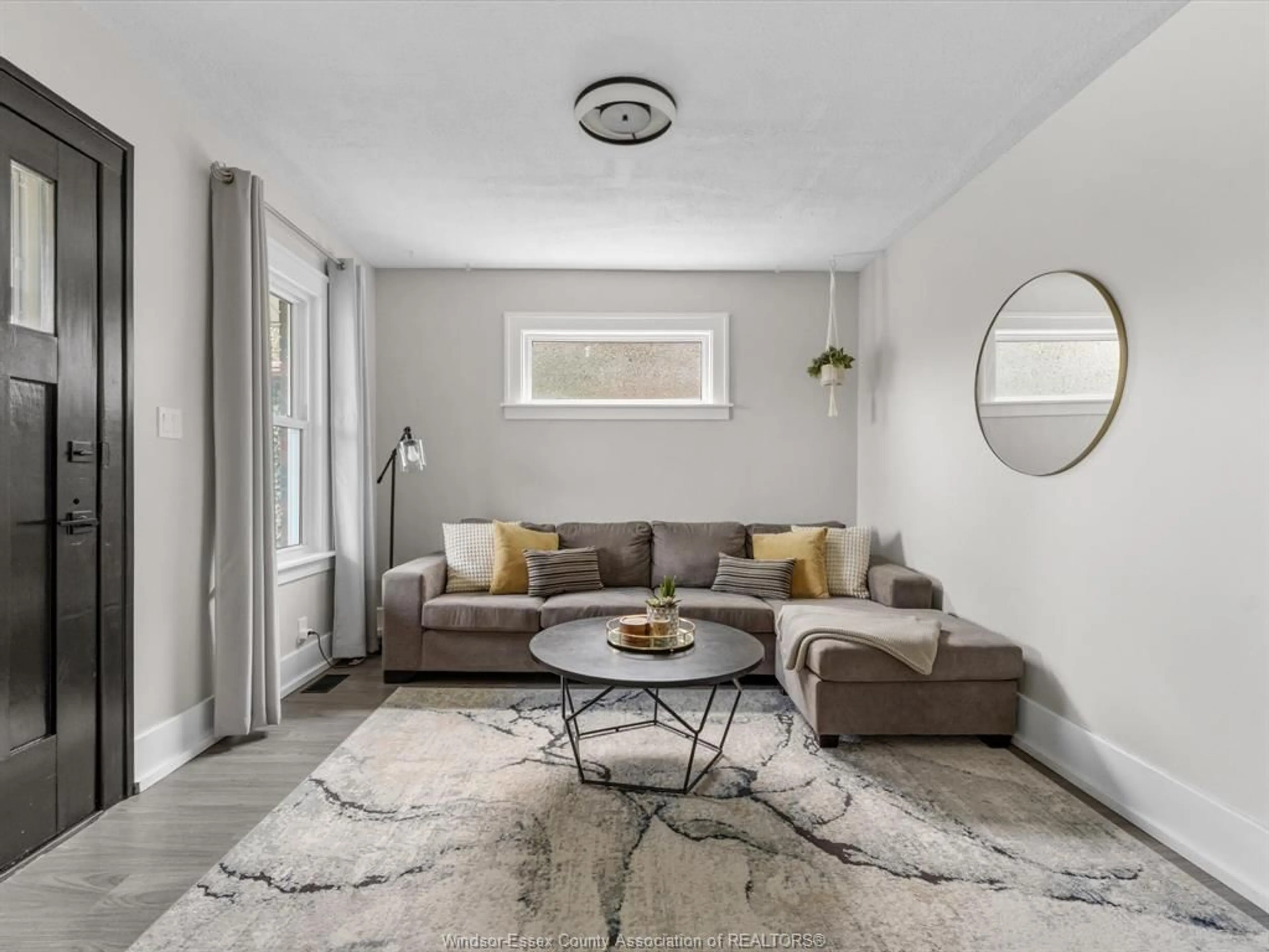 Living room with furniture, unknown for 1609 PILLETTE Rd, Windsor Ontario N8Y 3C4