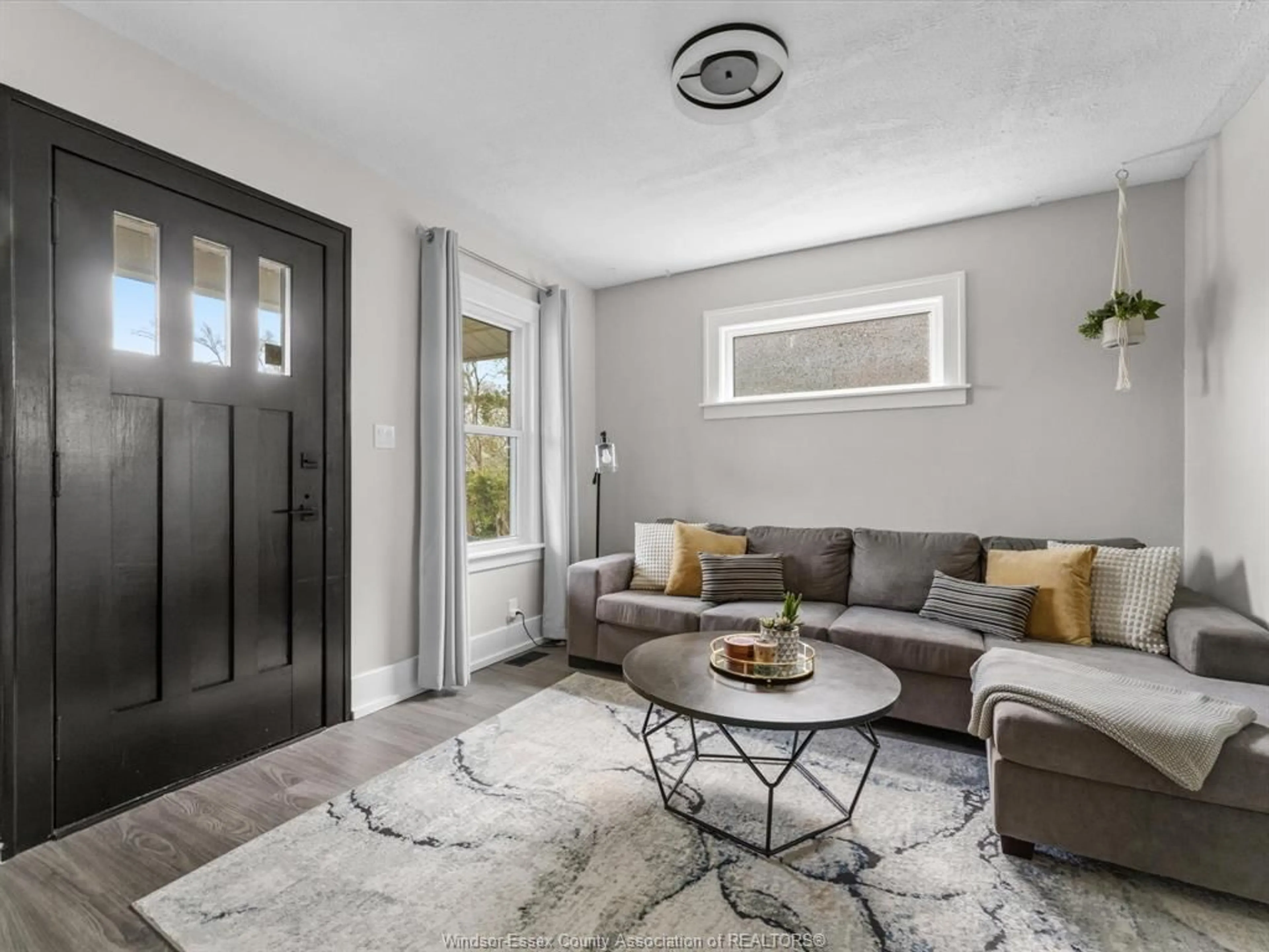 Living room with furniture, unknown for 1609 PILLETTE Rd, Windsor Ontario N8Y 3C4