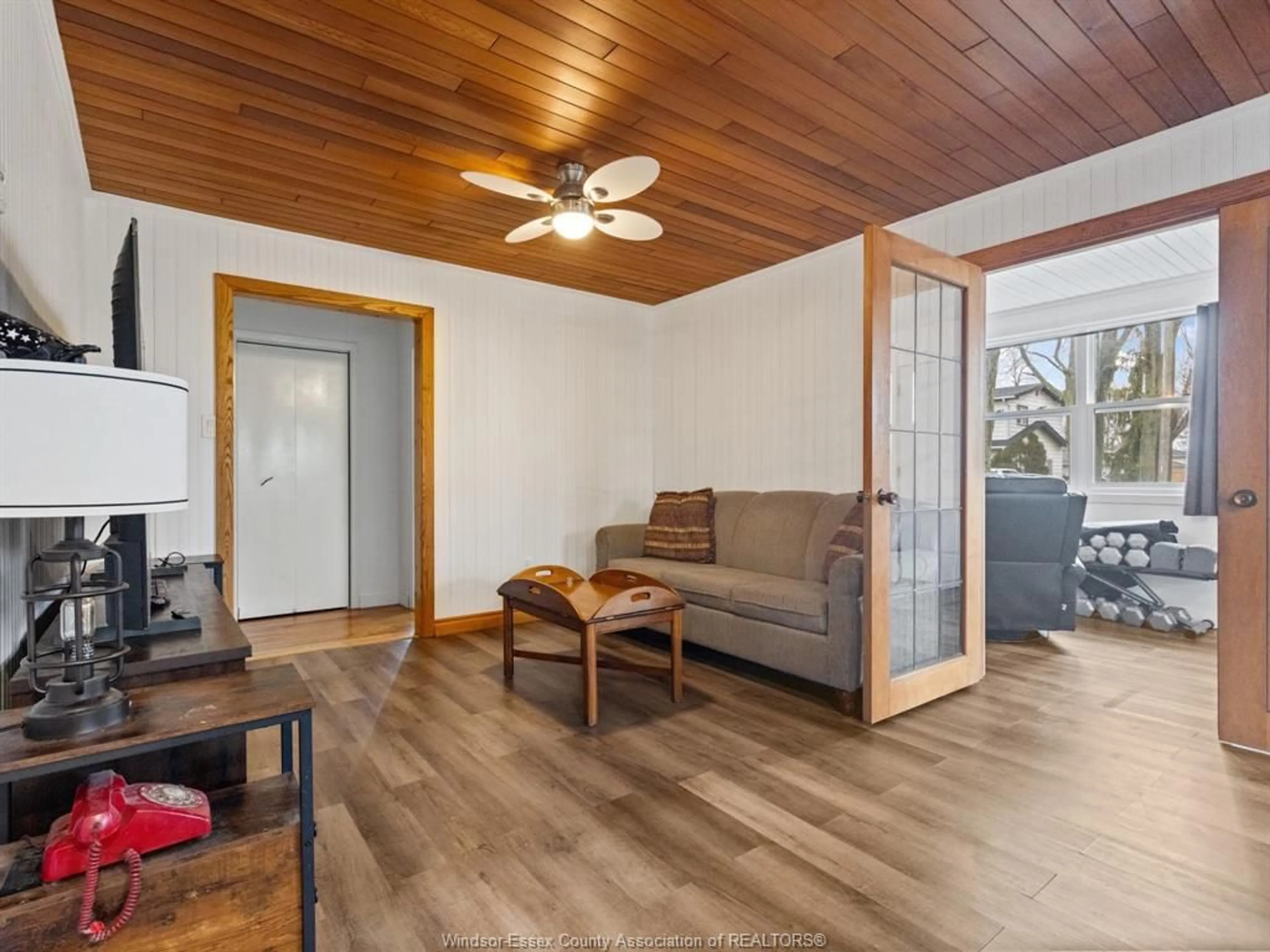 Living room with furniture, wood/laminate floor for 127 TILFORD Lane, Amherstburg Ontario N9V 2Y8