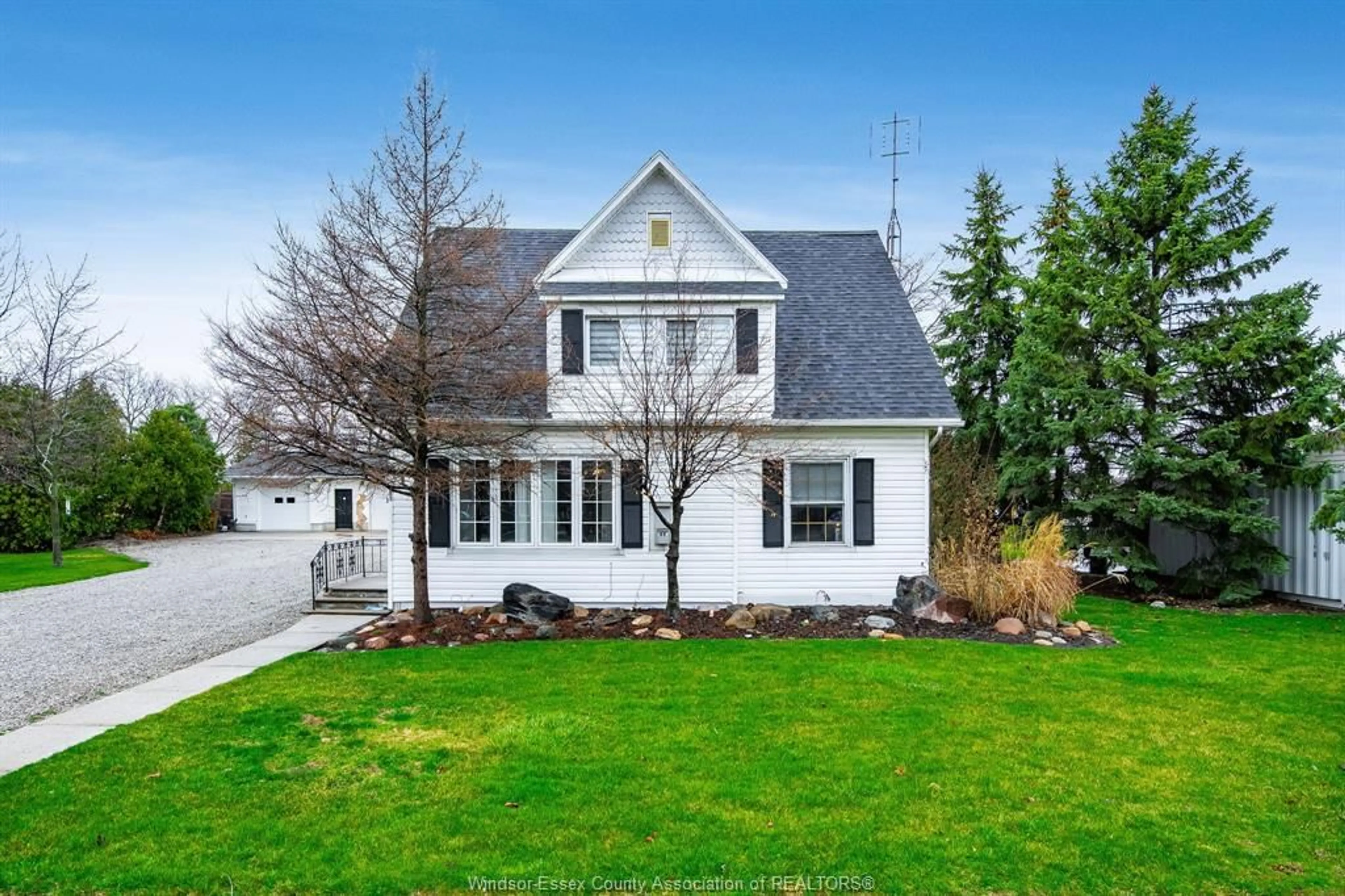 Home with vinyl exterior material, street for 151 BELLE RIVER Rd, Cottam Ontario N0R 1B0