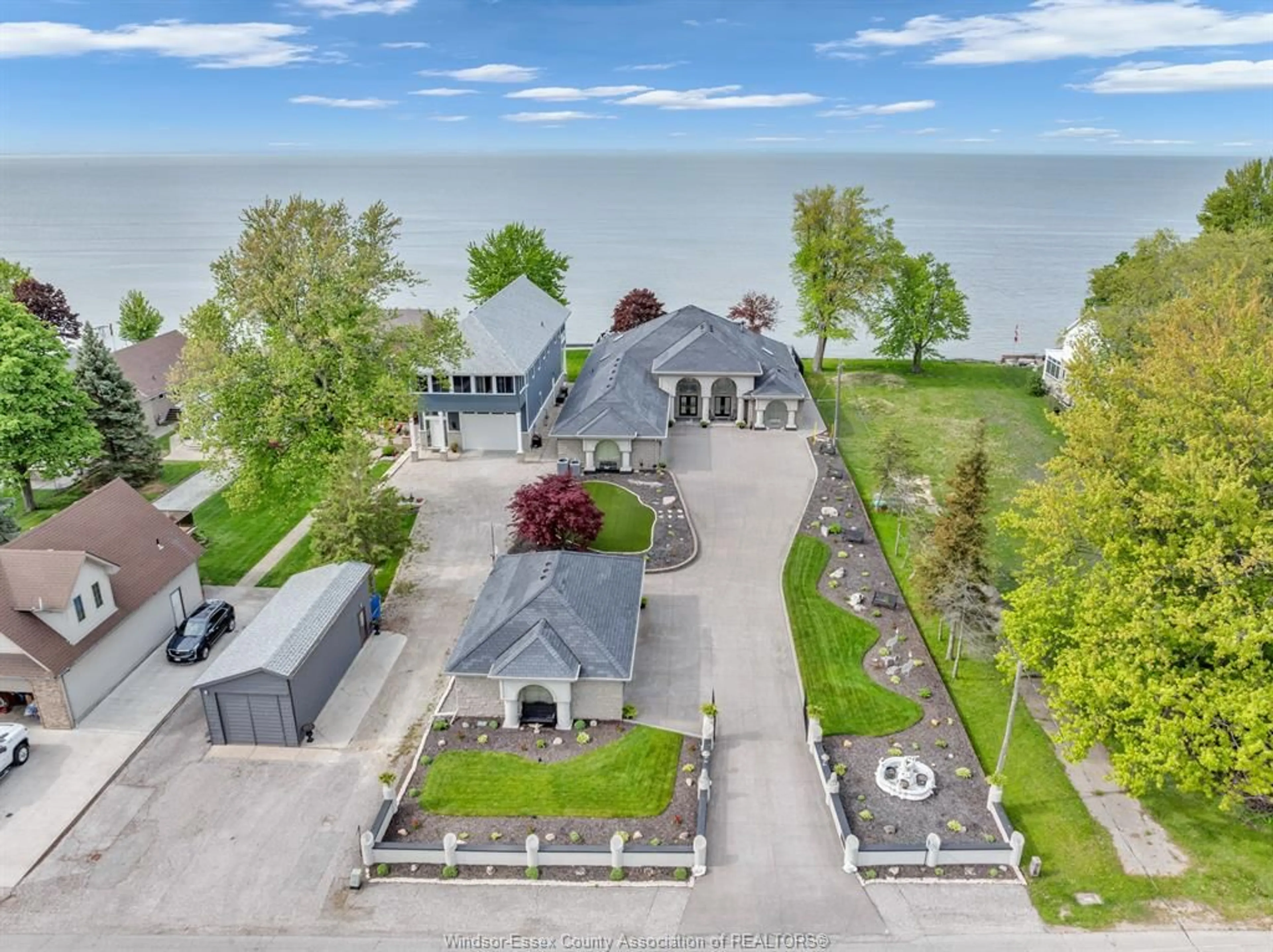 A pic from outside/outdoor area/front of a property/back of a property/a pic from drone, water/lake/river/ocean view for 1702 CAILLE Ave, Lakeshore Ontario N8L 0J4