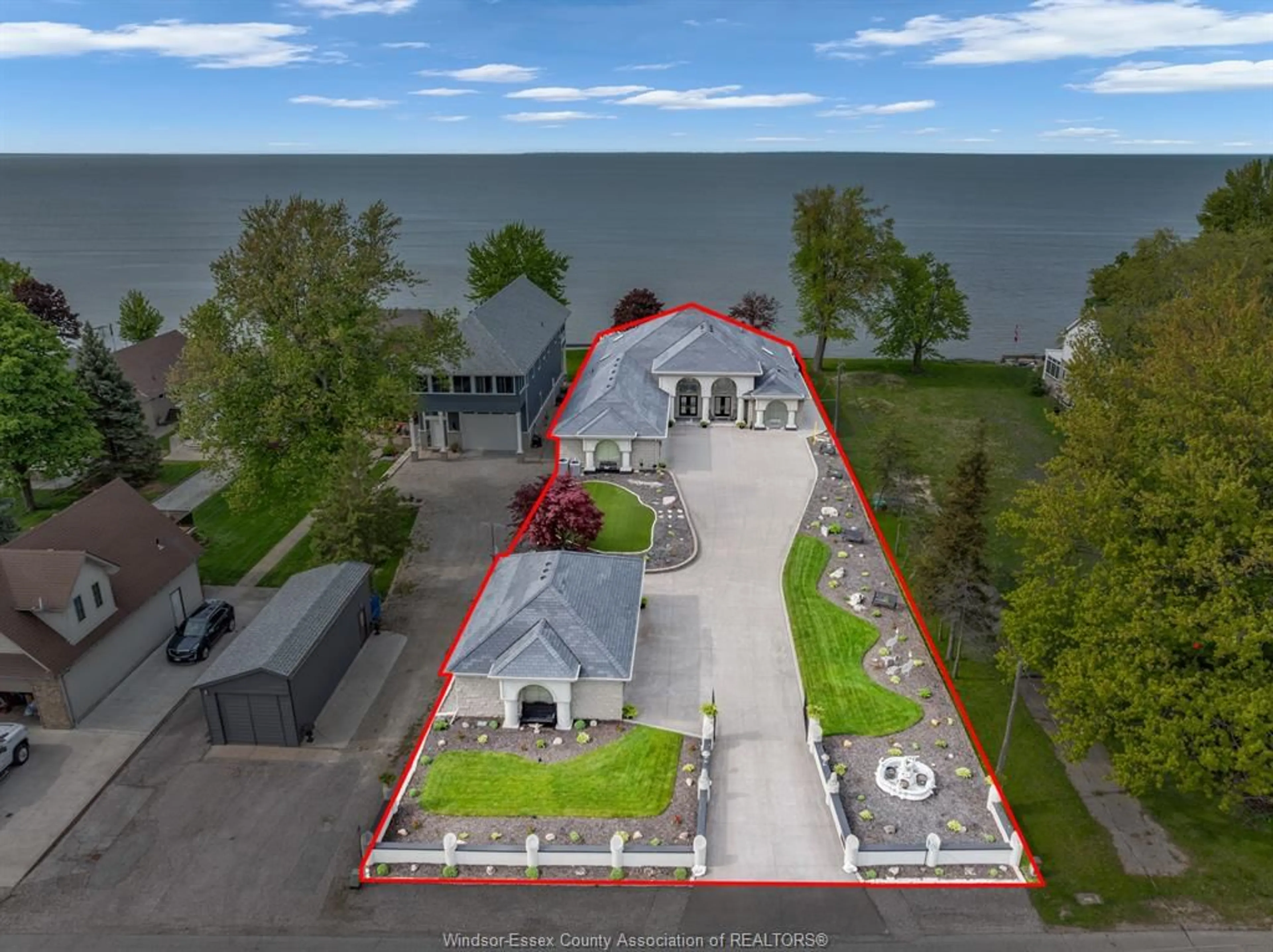 A pic from outside/outdoor area/front of a property/back of a property/a pic from drone, water/lake/river/ocean view for 1702 CAILLE Ave, Lakeshore Ontario N8L 0J4