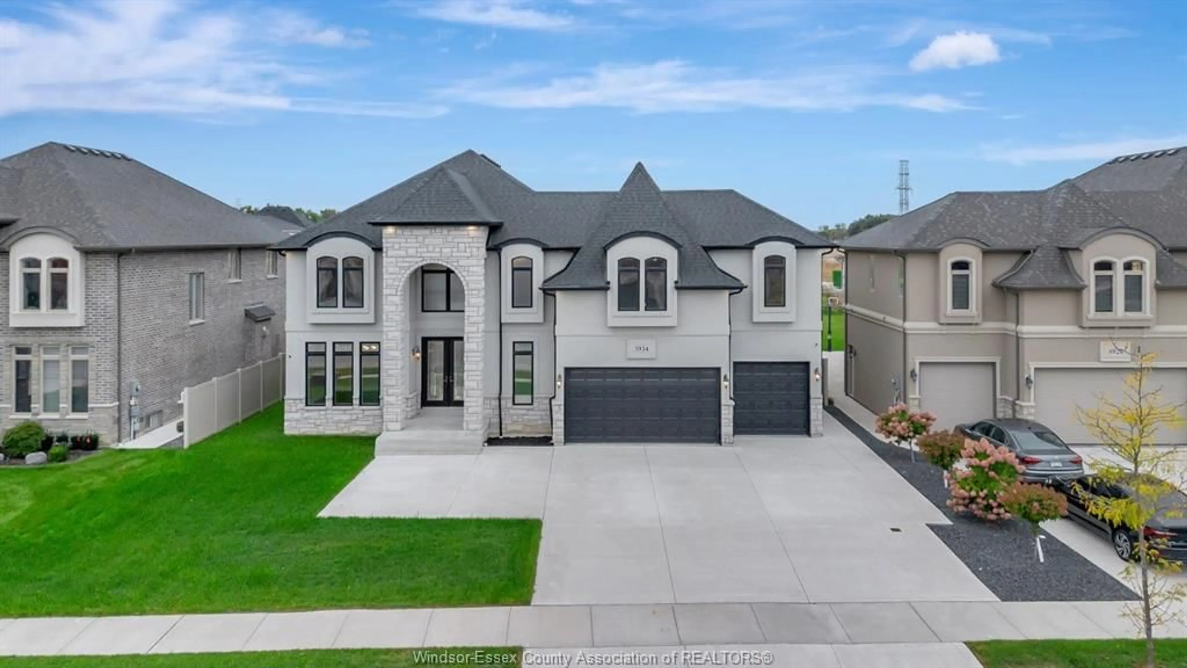 Home with brick exterior material, street for 3934 LASALLE WOODS Blvd, LaSalle Ontario N9H 0G6