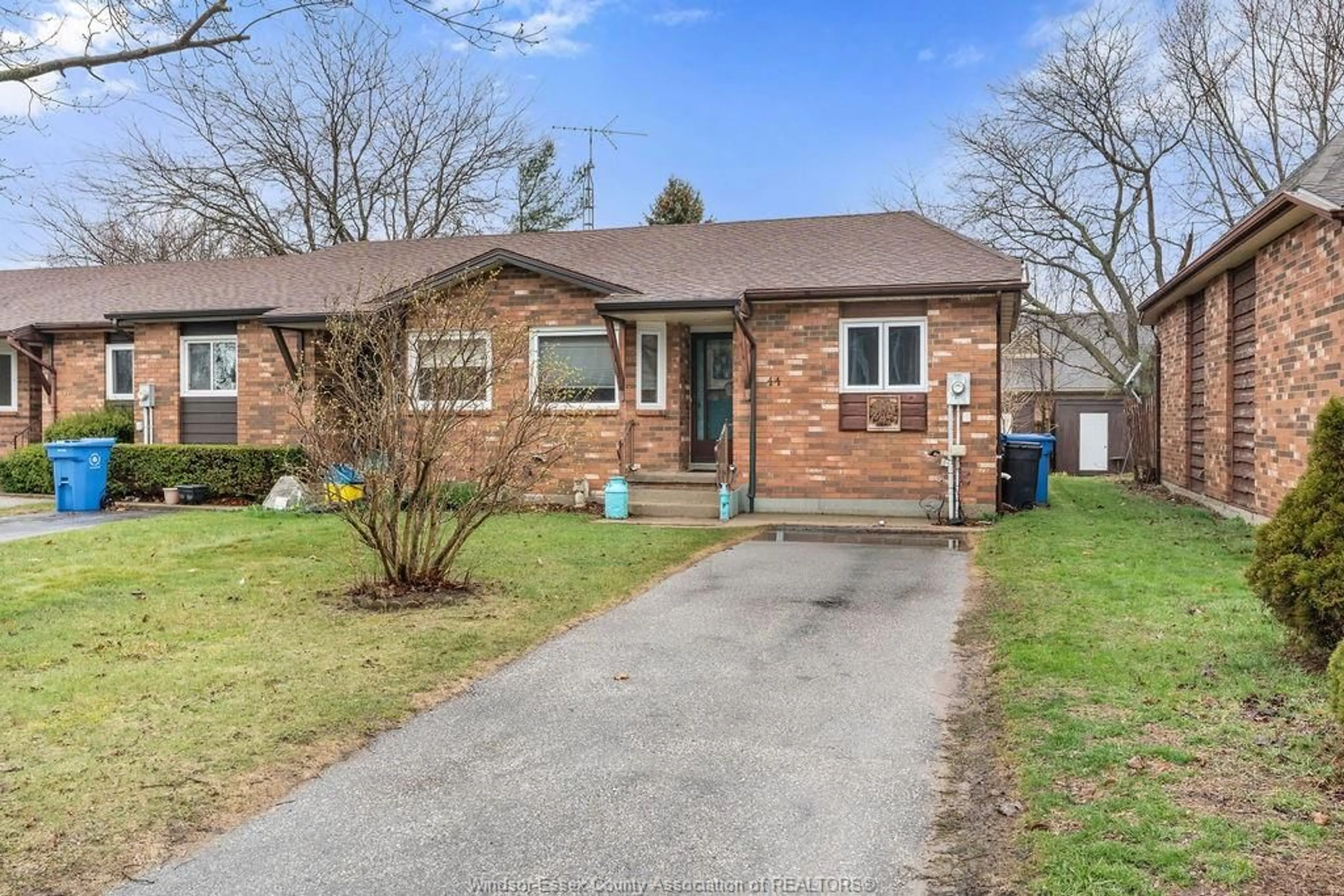 Home with brick exterior material, street for 44 REMARK Dr, Kingsville Ontario N9Y 3X6