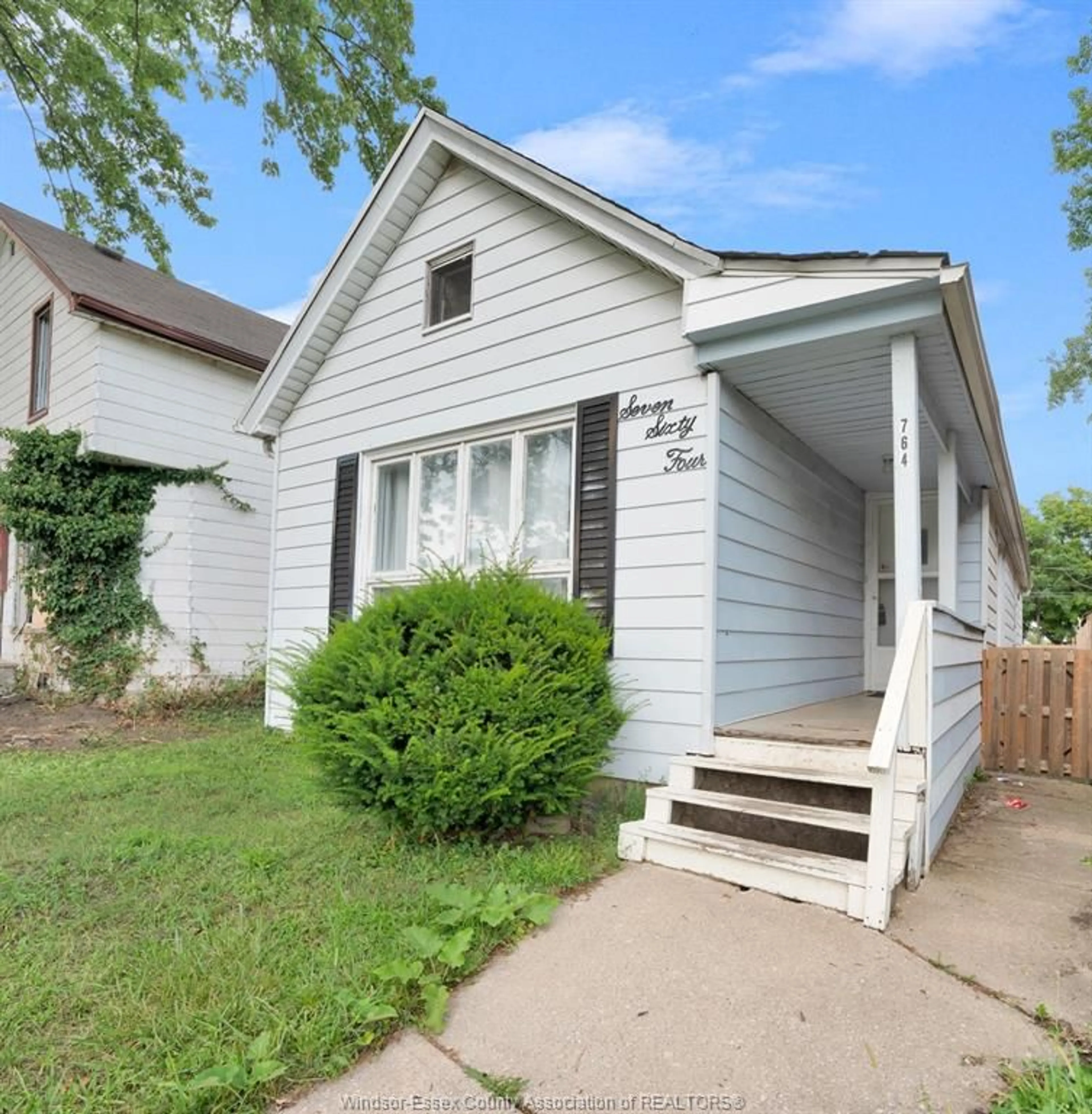 Home with vinyl exterior material, street for 764 WINDSOR Ave, Windsor Ontario N9A 1J9