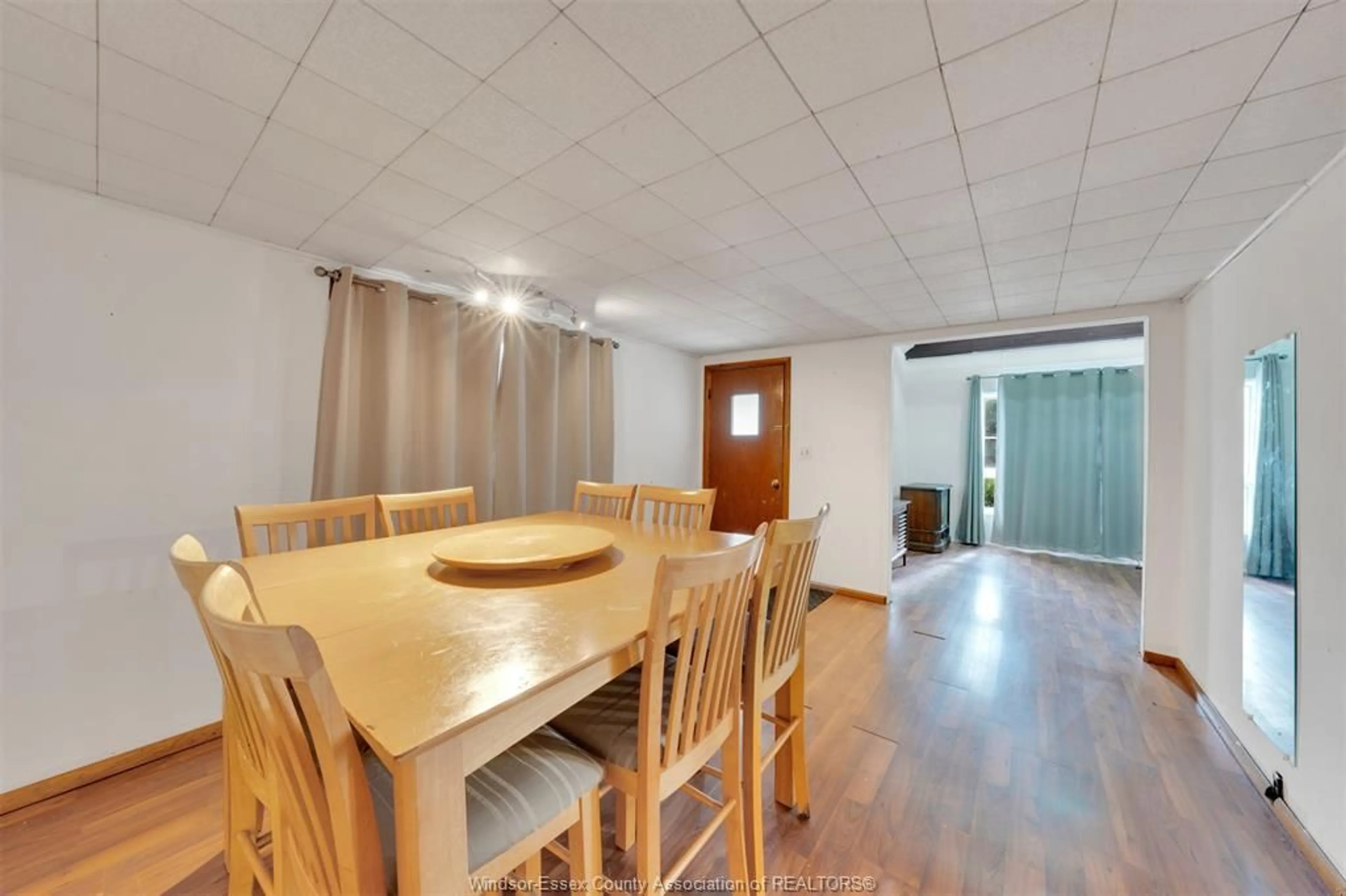 Dining room, wood/laminate floor for 764 WINDSOR Ave, Windsor Ontario N9A 1J9