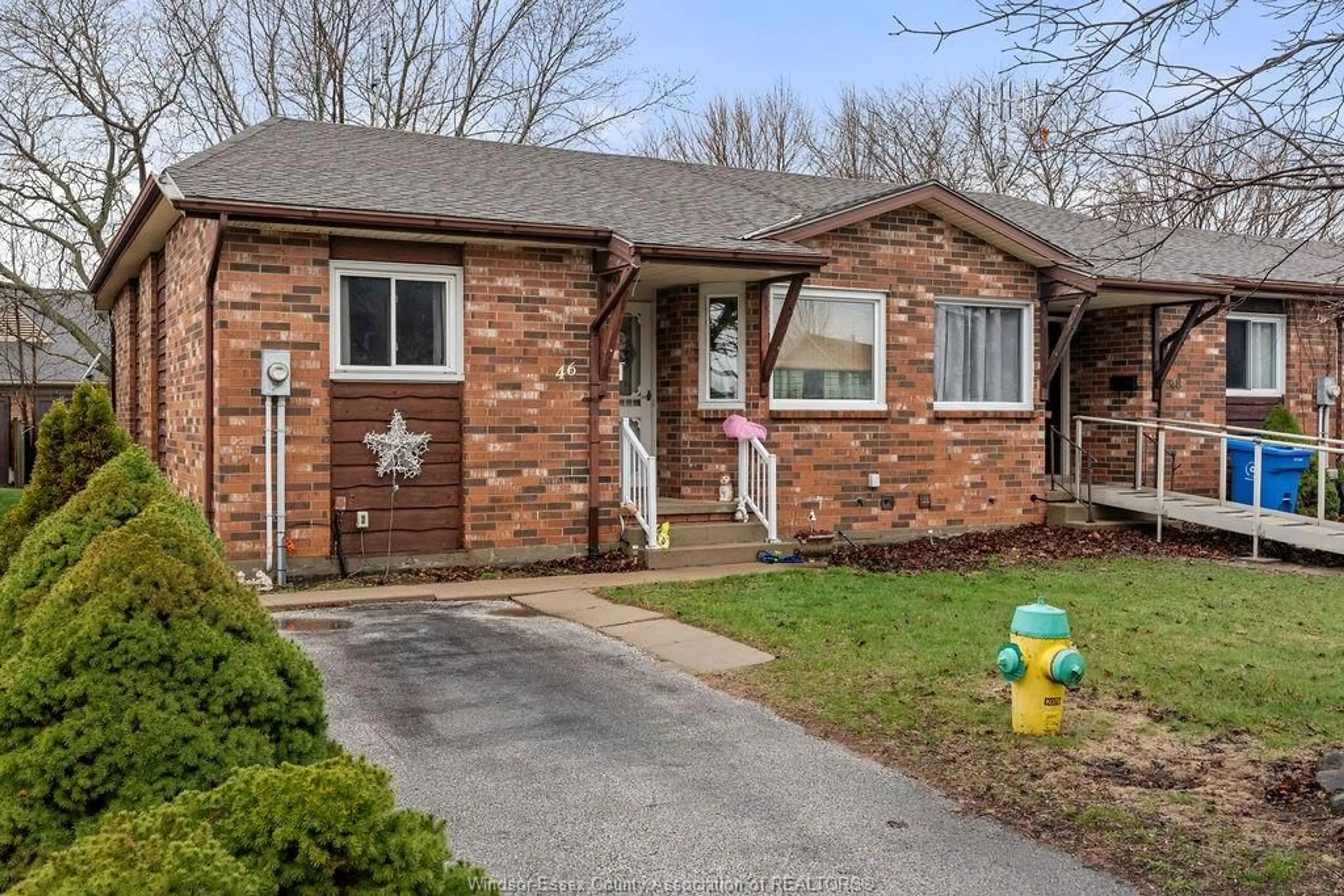 Home with brick exterior material, street for 46 REMARK Dr, Kingsville Ontario N9Y 3X6