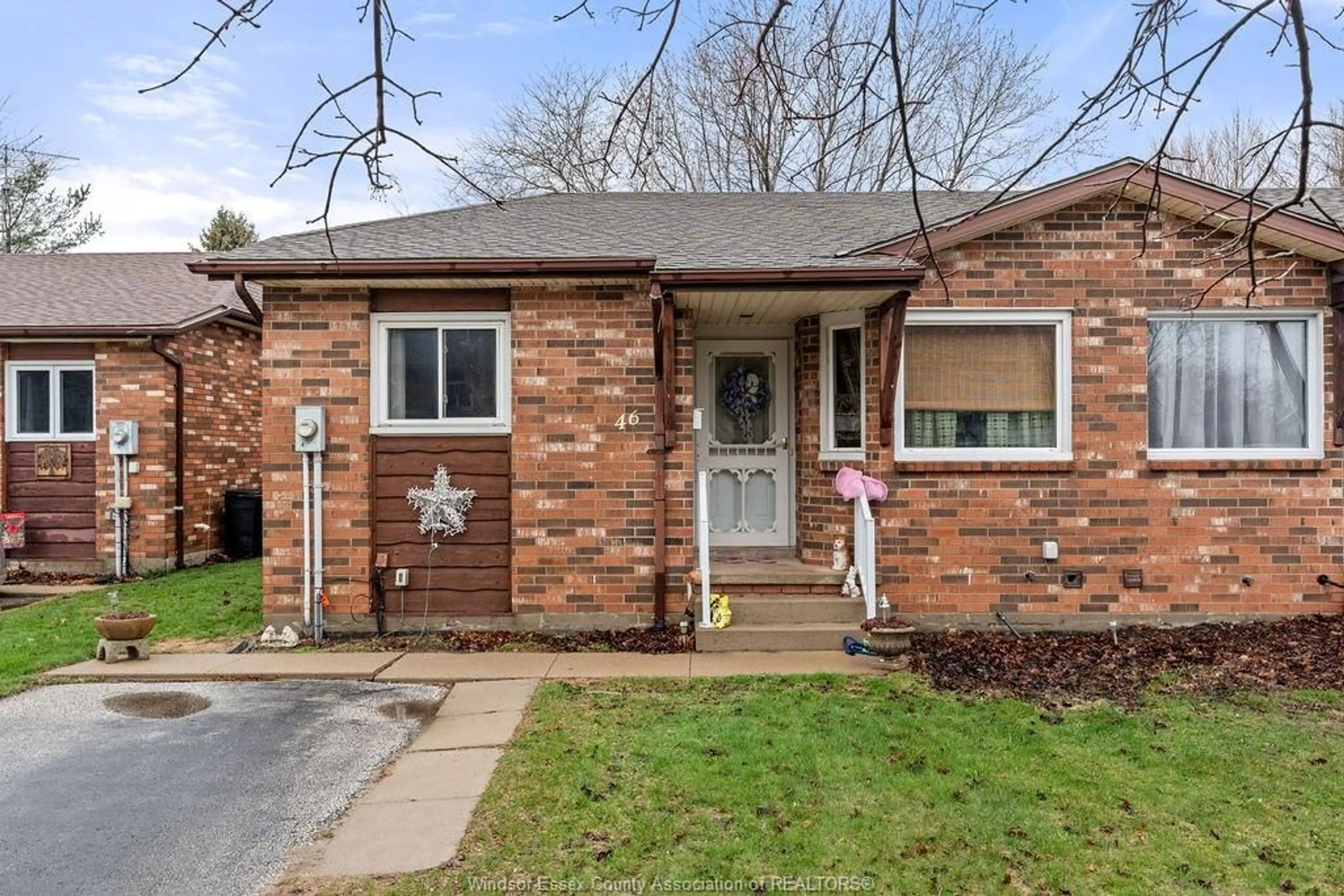 Home with brick exterior material, street for 46 REMARK Dr, Kingsville Ontario N9Y 3X6