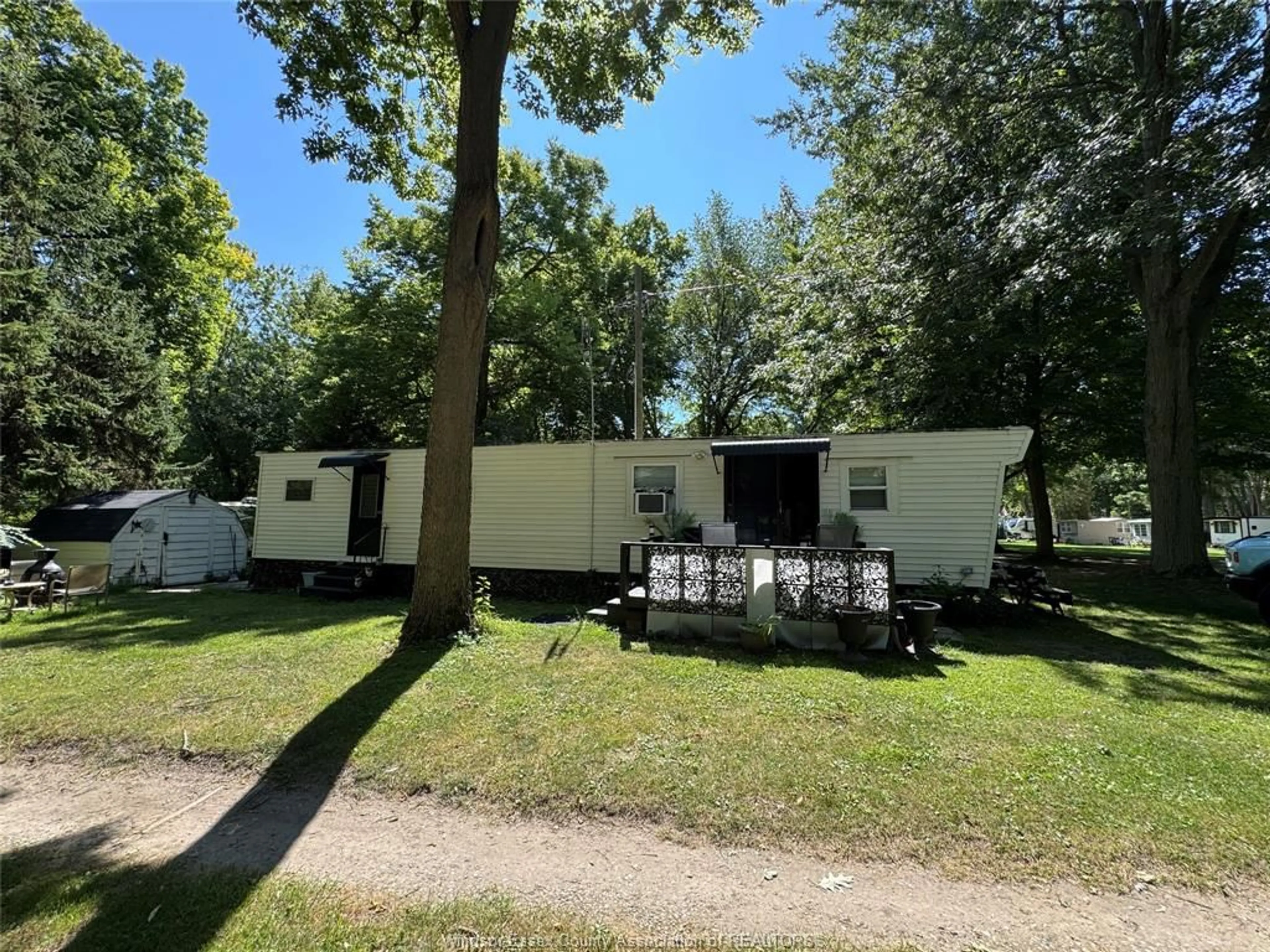 A pic from outside/outdoor area/front of a property/back of a property/a pic from drone, unknown for 445 COUNTY ROAD 50 #4, Essex Ontario N0R 1G0