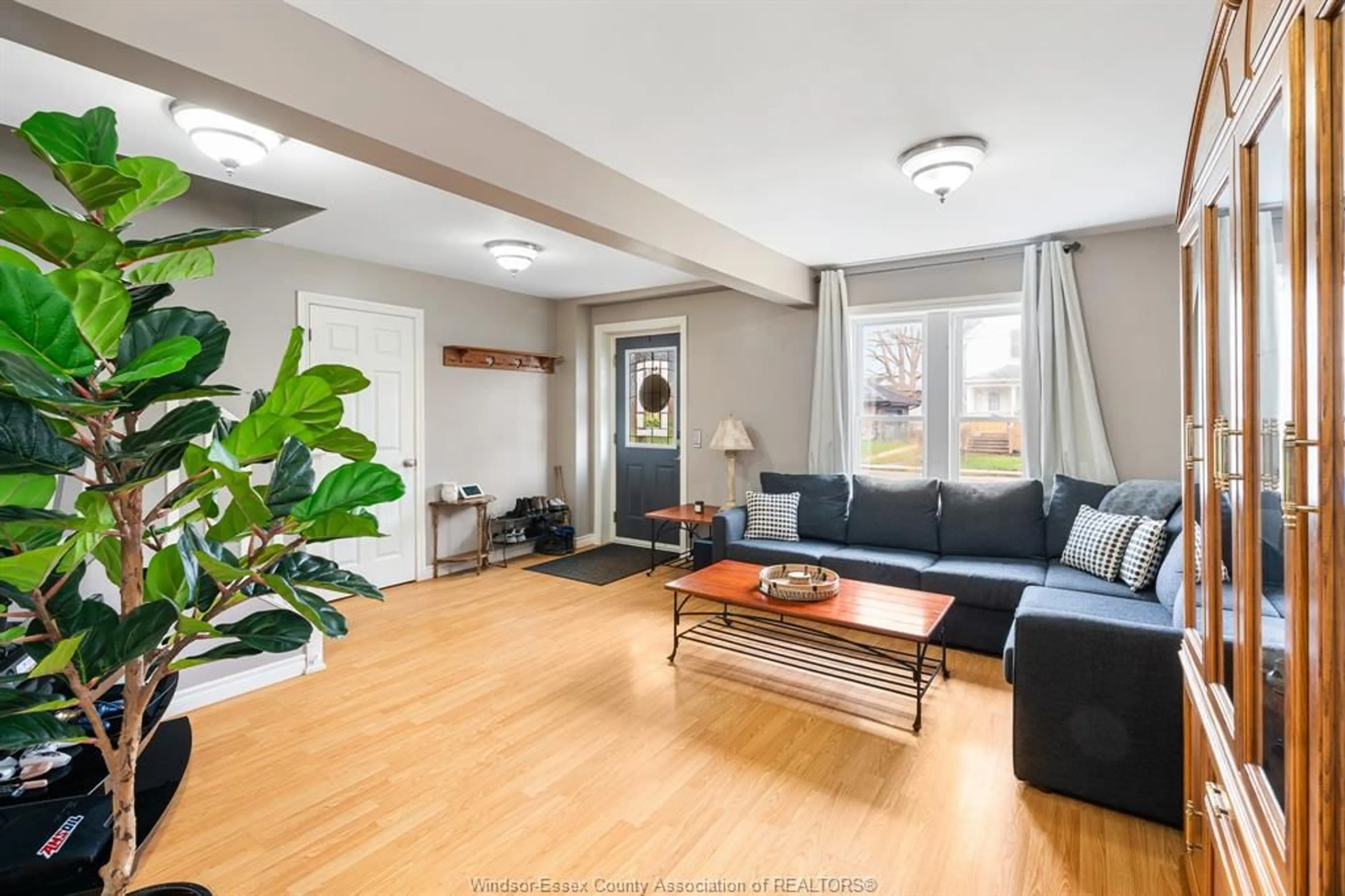 Living room with furniture, wood/laminate floor for 198 Raleigh, Chatham Ontario N7M 2N7