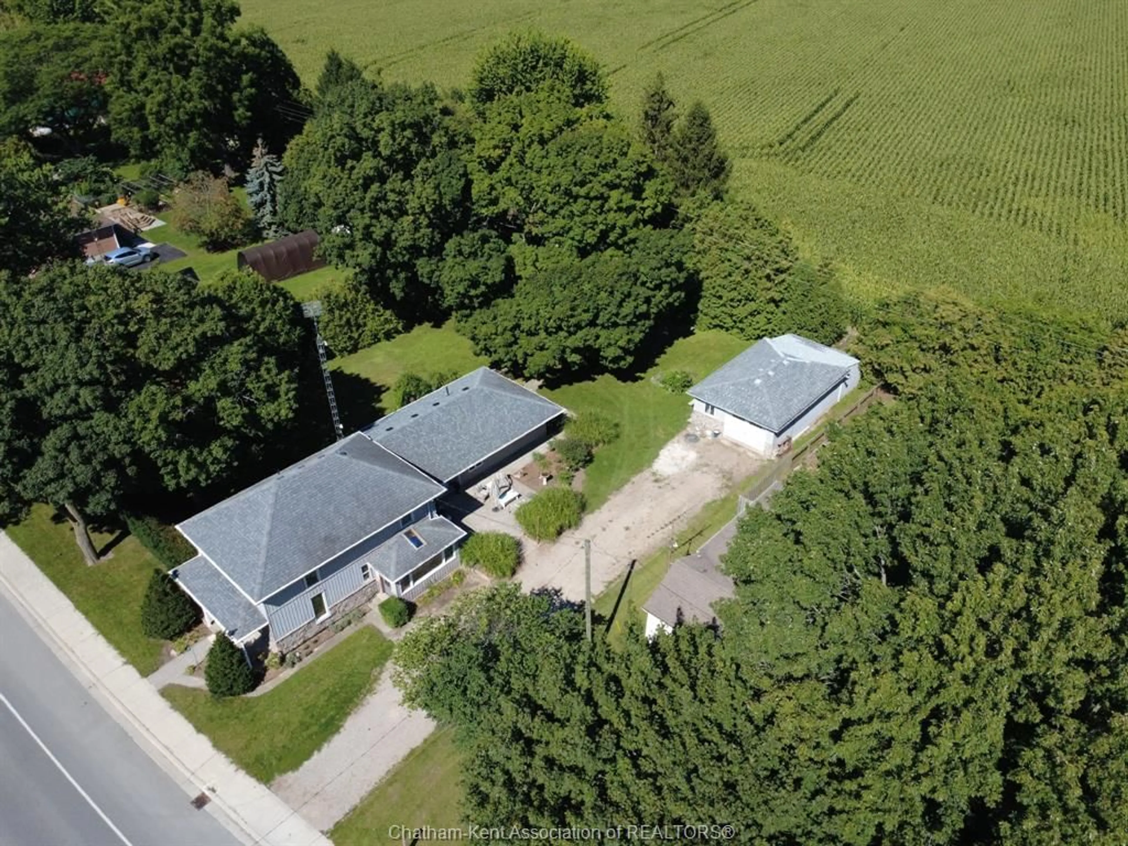 A pic from outside/outdoor area/front of a property/back of a property/a pic from drone, building for 10517 Longwoods Road Rd, Chatham Township Ontario N7M 5J7
