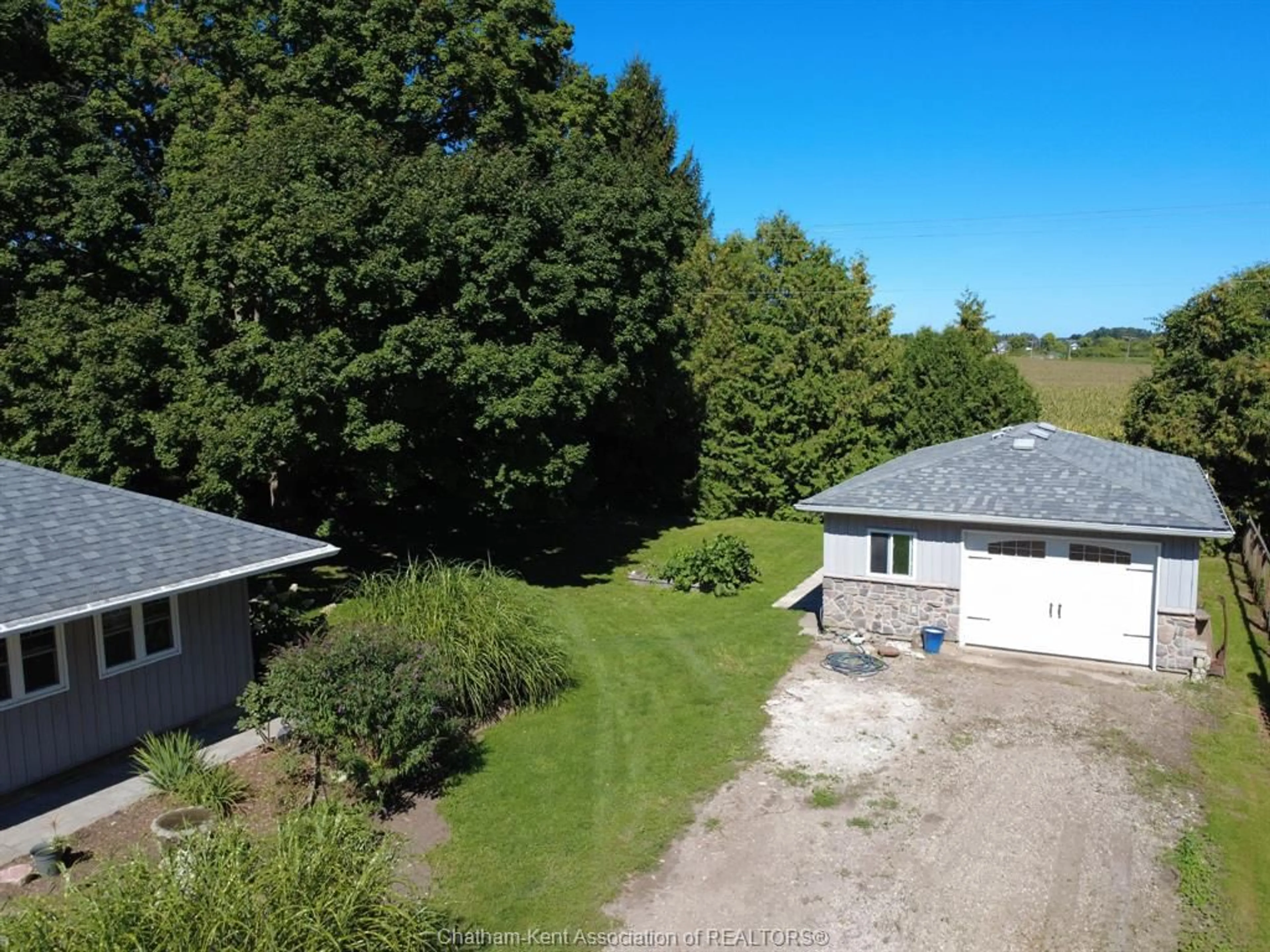 A pic from outside/outdoor area/front of a property/back of a property/a pic from drone, unknown for 10517 Longwoods Road Rd, Chatham Township Ontario N7M 5J7