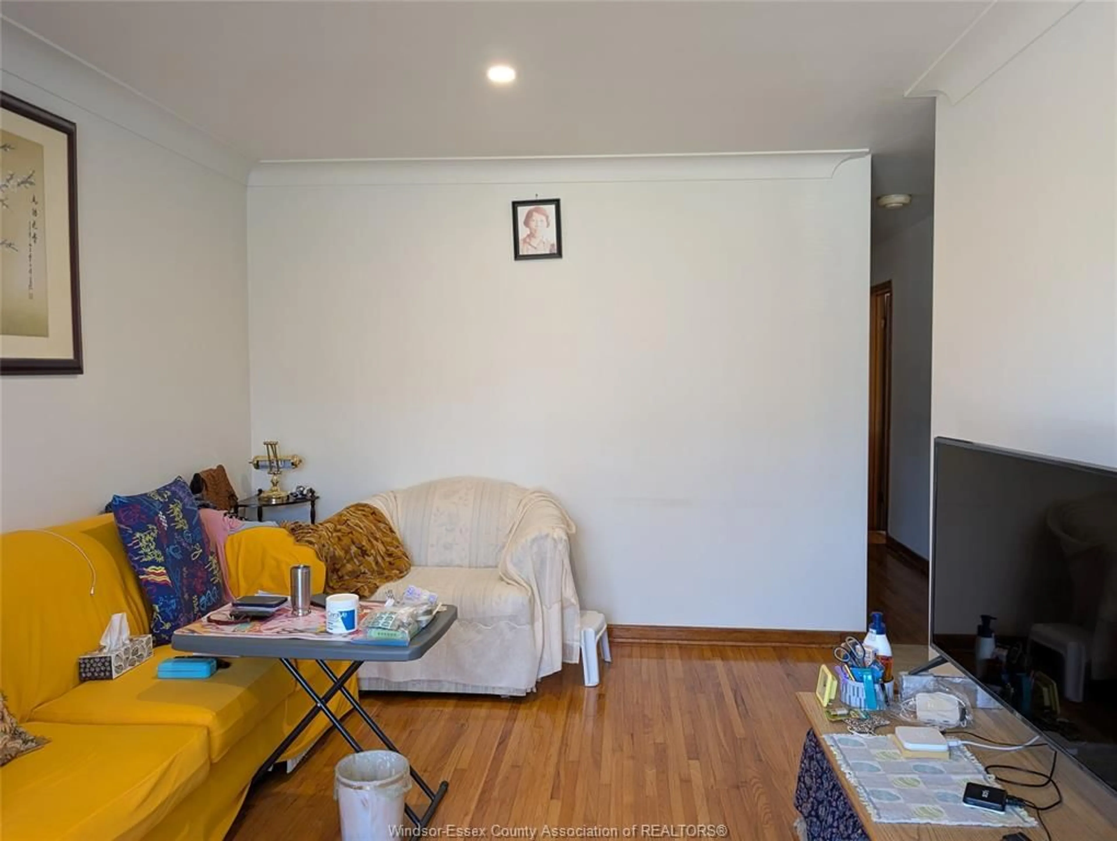 Living room with furniture, wood/laminate floor for 1314 JANETTE, Windsor Ontario N8X 1Y6