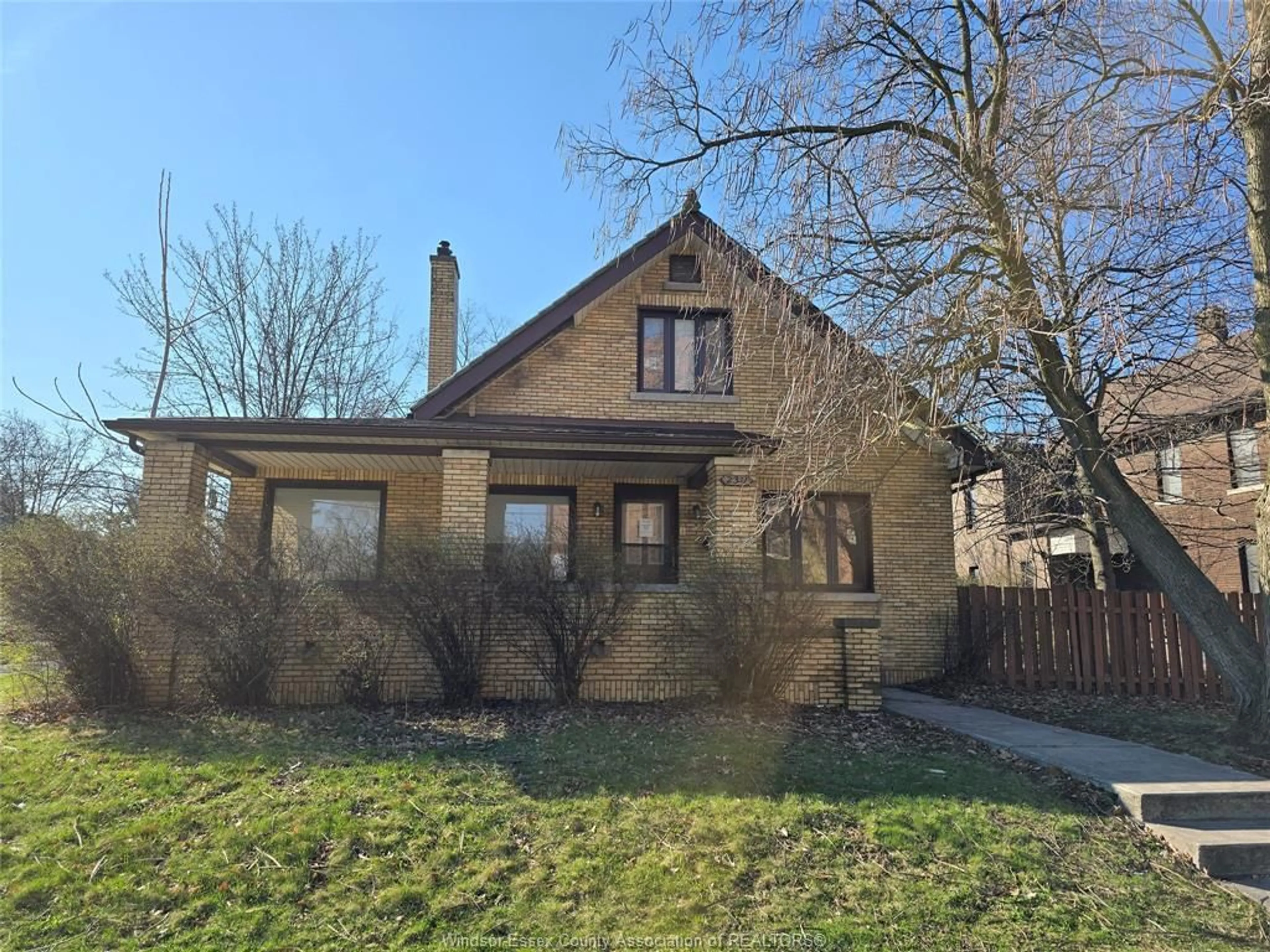 Home with brick exterior material, street for 2311 UNIVERSITY Ave, Windsor Ontario N9B 1E8
