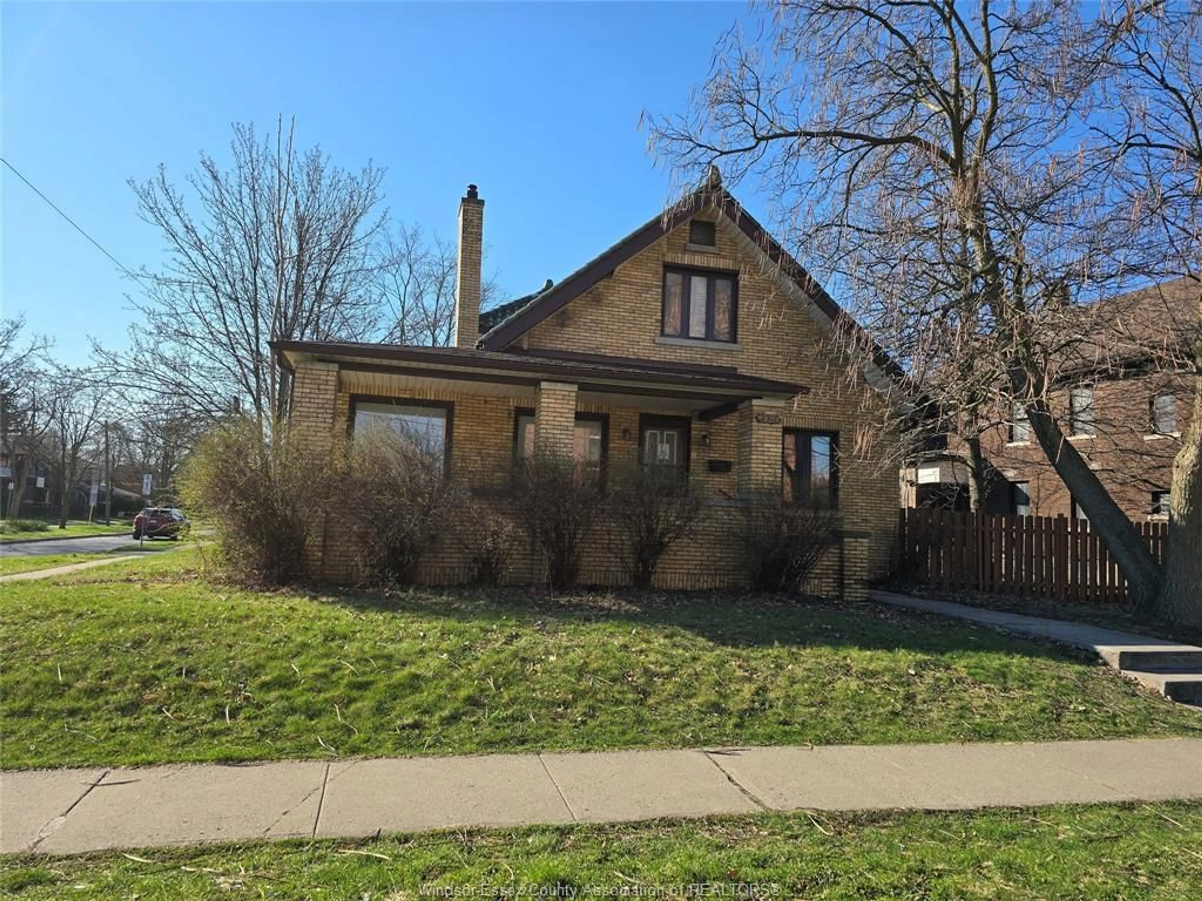 Home with brick exterior material, street for 2311 UNIVERSITY Ave, Windsor Ontario N9B 1E8