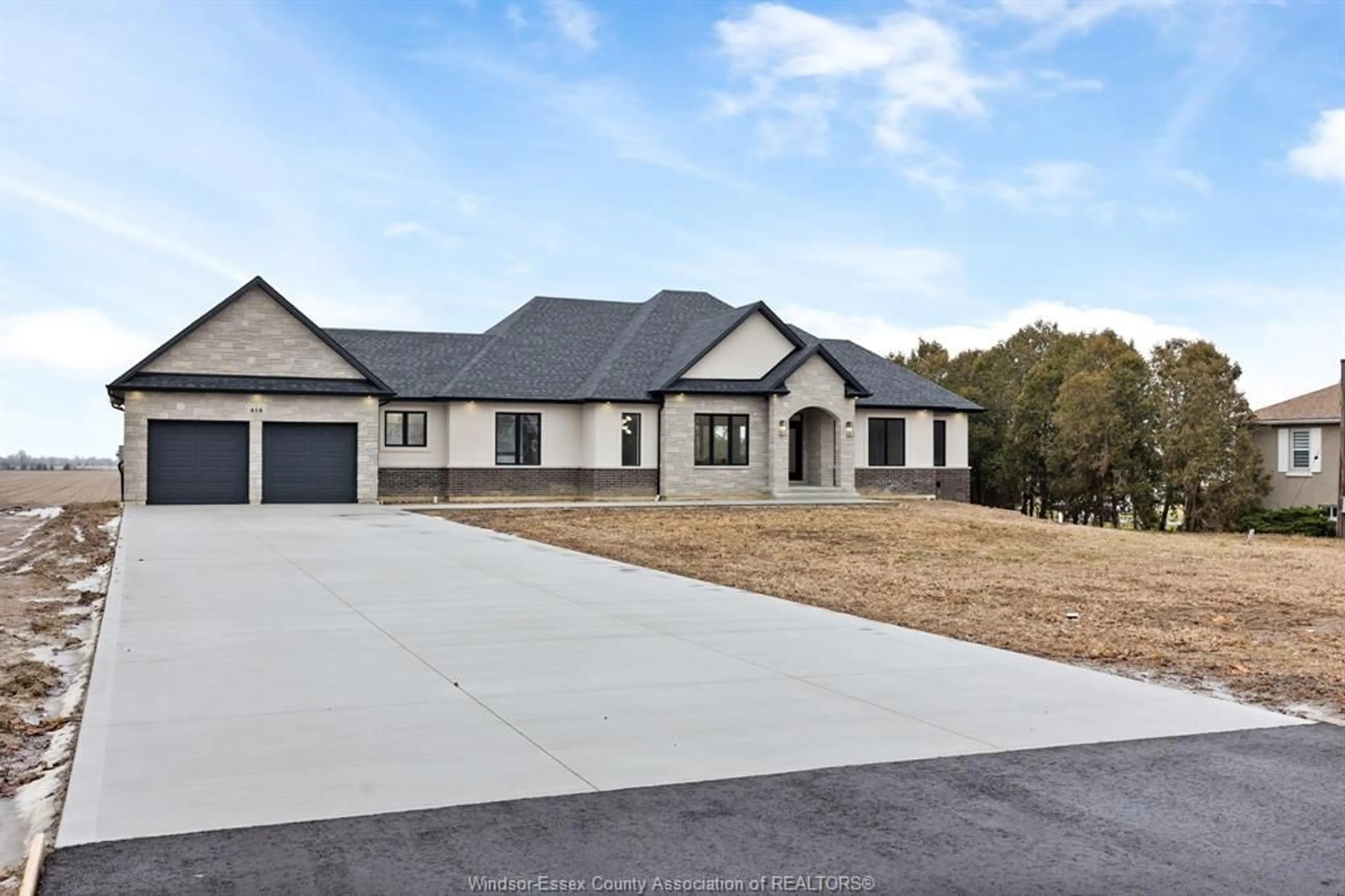 Home with brick exterior material, street for 418 COUNTY RD 34, Kingsville Ontario N8H 3V6