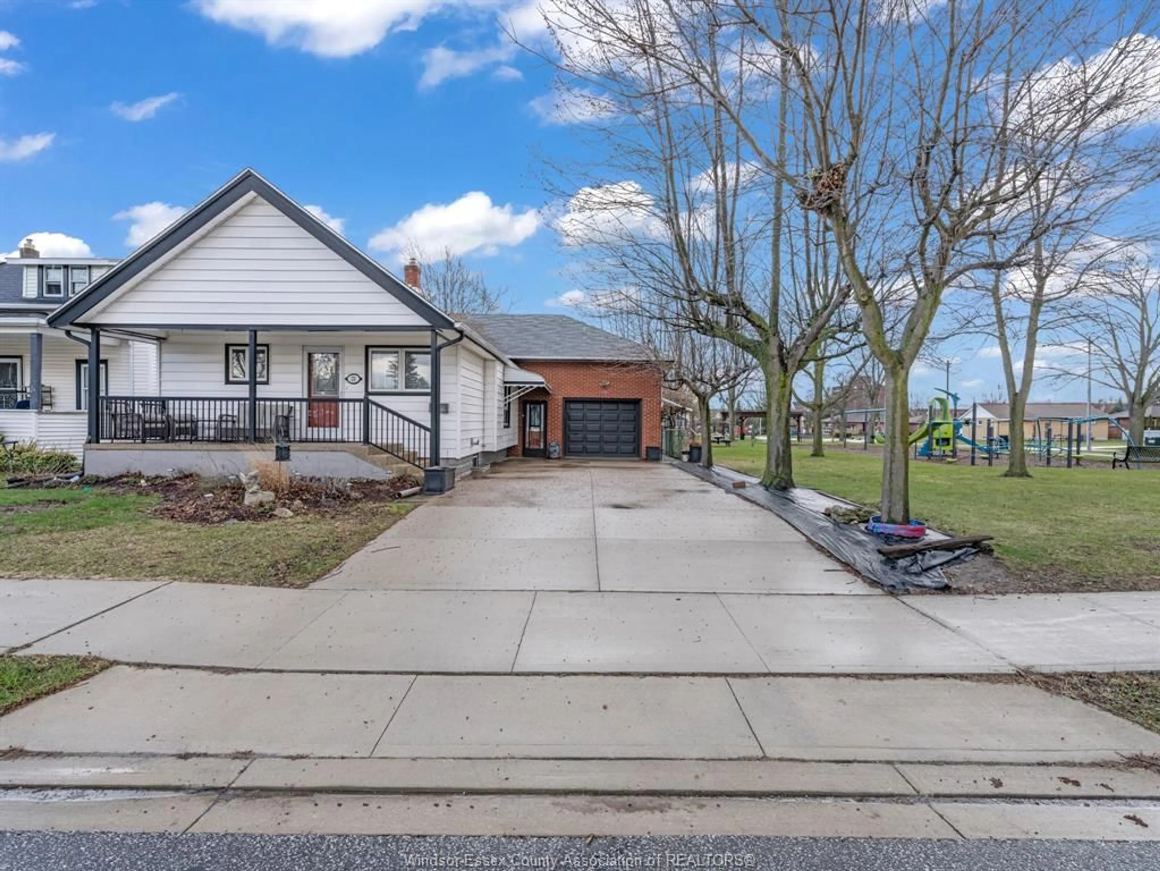 A pic from outside/outdoor area/front of a property/back of a property/a pic from drone, street for 24 Melrose Ave, Leamington Ontario N8H 2H8