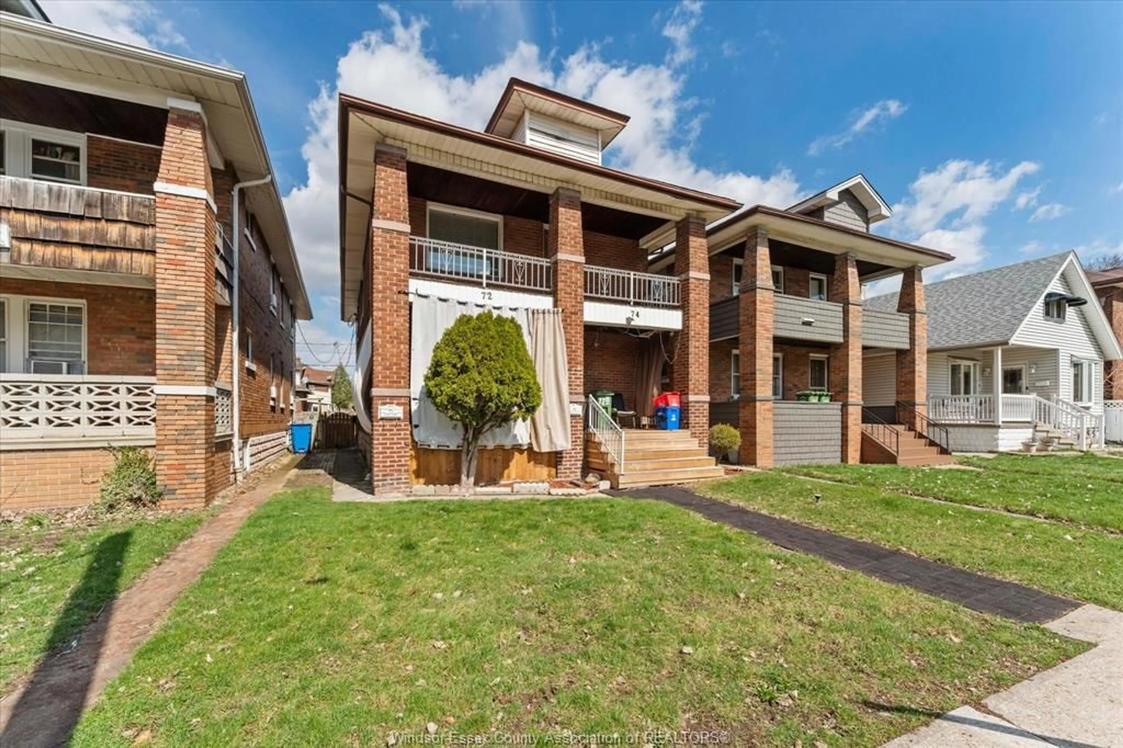 Home with brick exterior material, unknown for 72-74 HANNA St, Windsor Ontario N8X 2M9