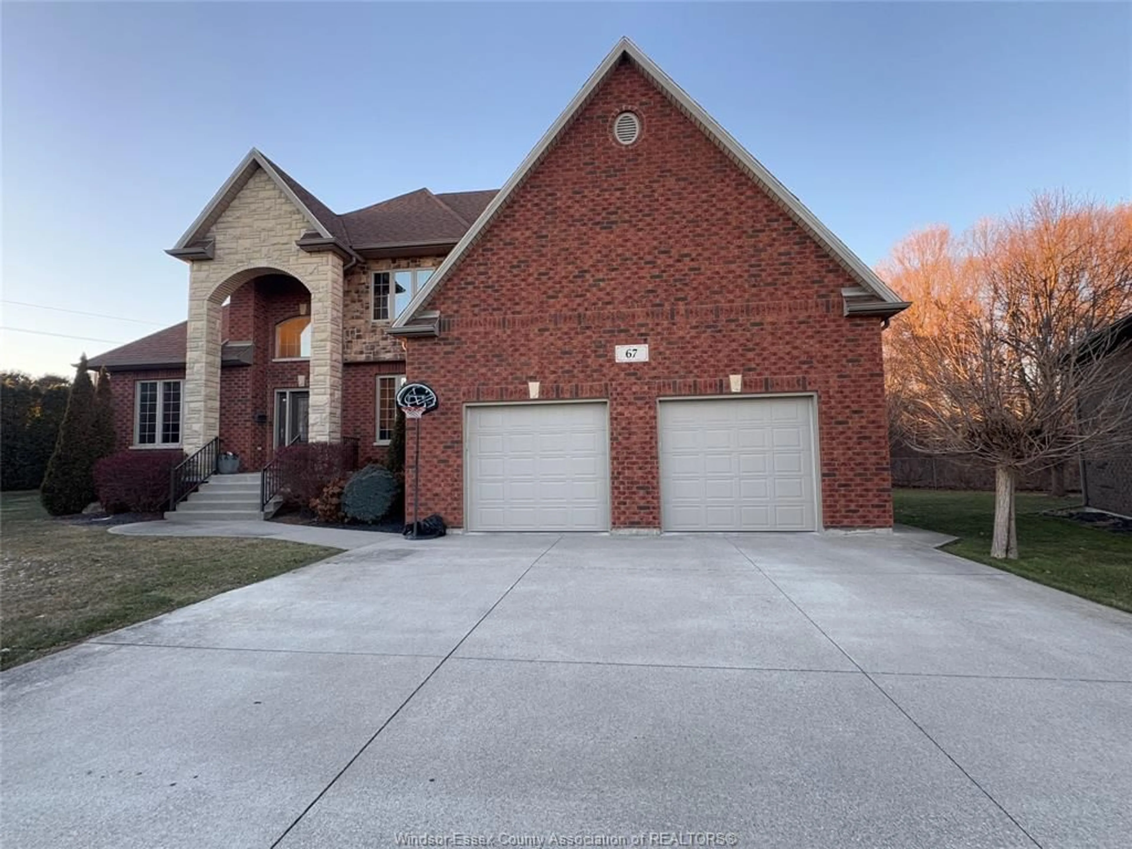Home with brick exterior material, street for 67 THERESA Trail, Leamington Ontario N8H 5M8