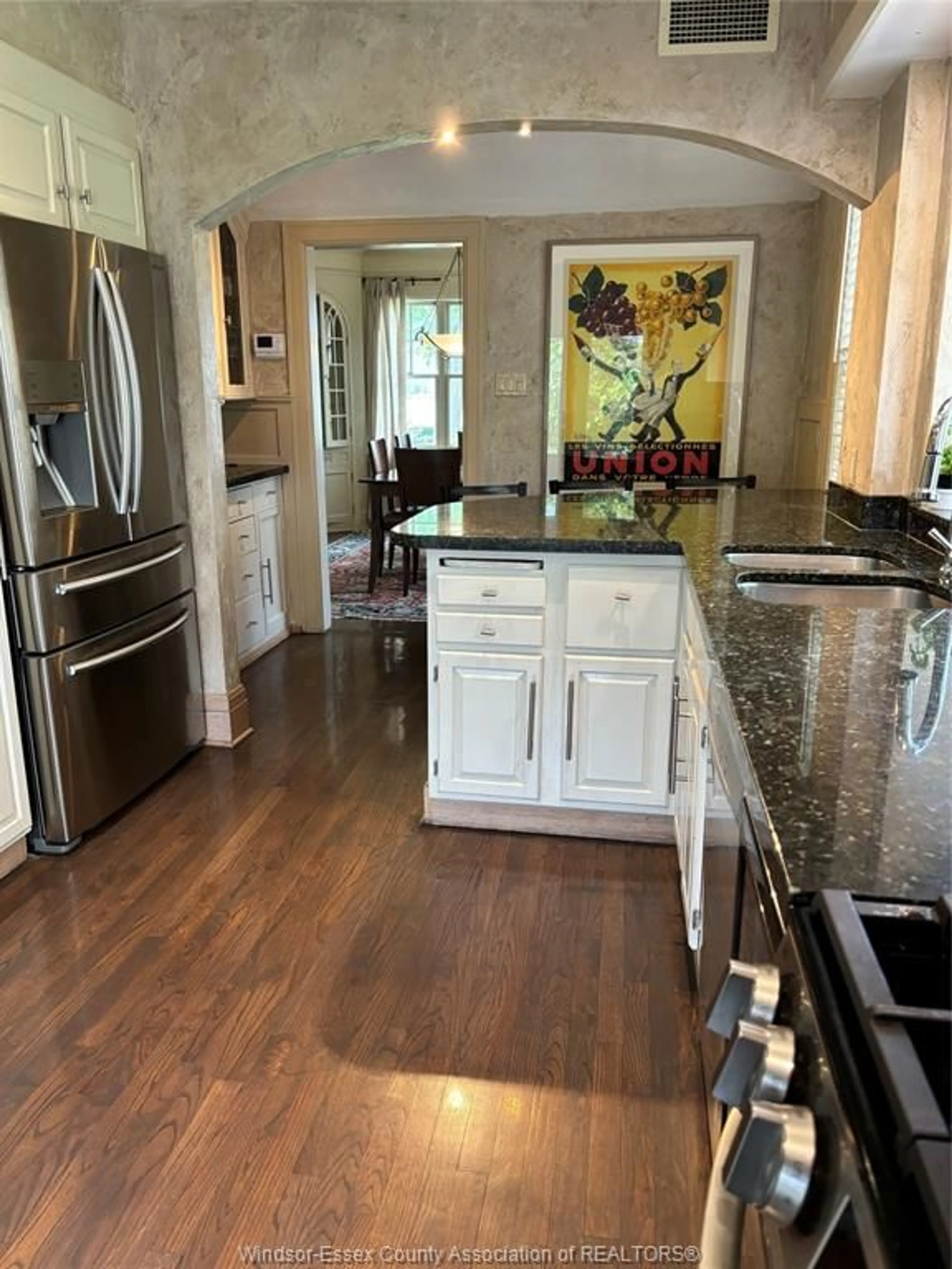 Open concept kitchen, ceramic/tile floor for 7505 Riverside Dr, Windsor Ontario N8S 1C8