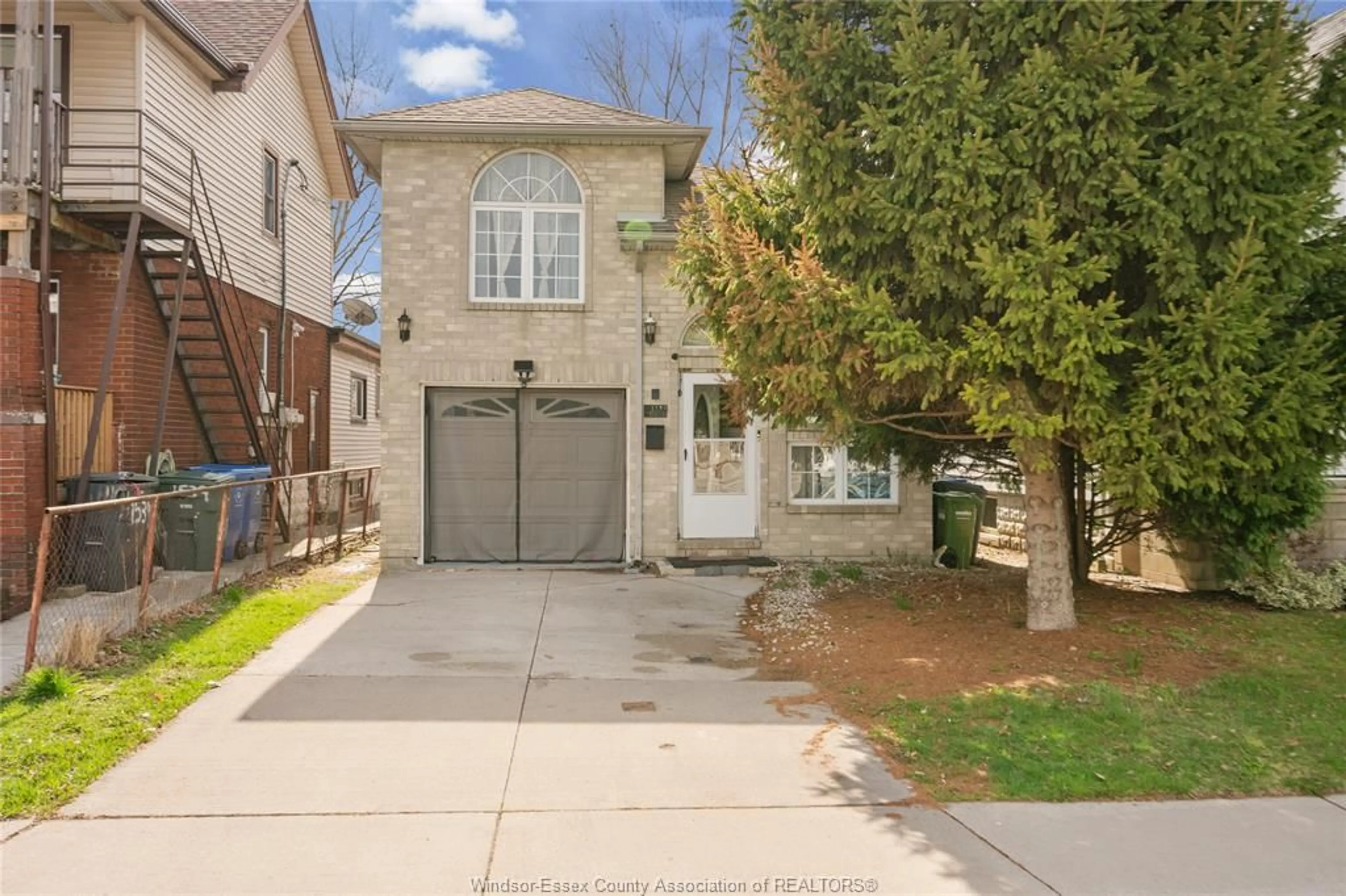 Home with brick exterior material, street for 1537 LANGLOIS Ave, Windsor Ontario N8X 4M3