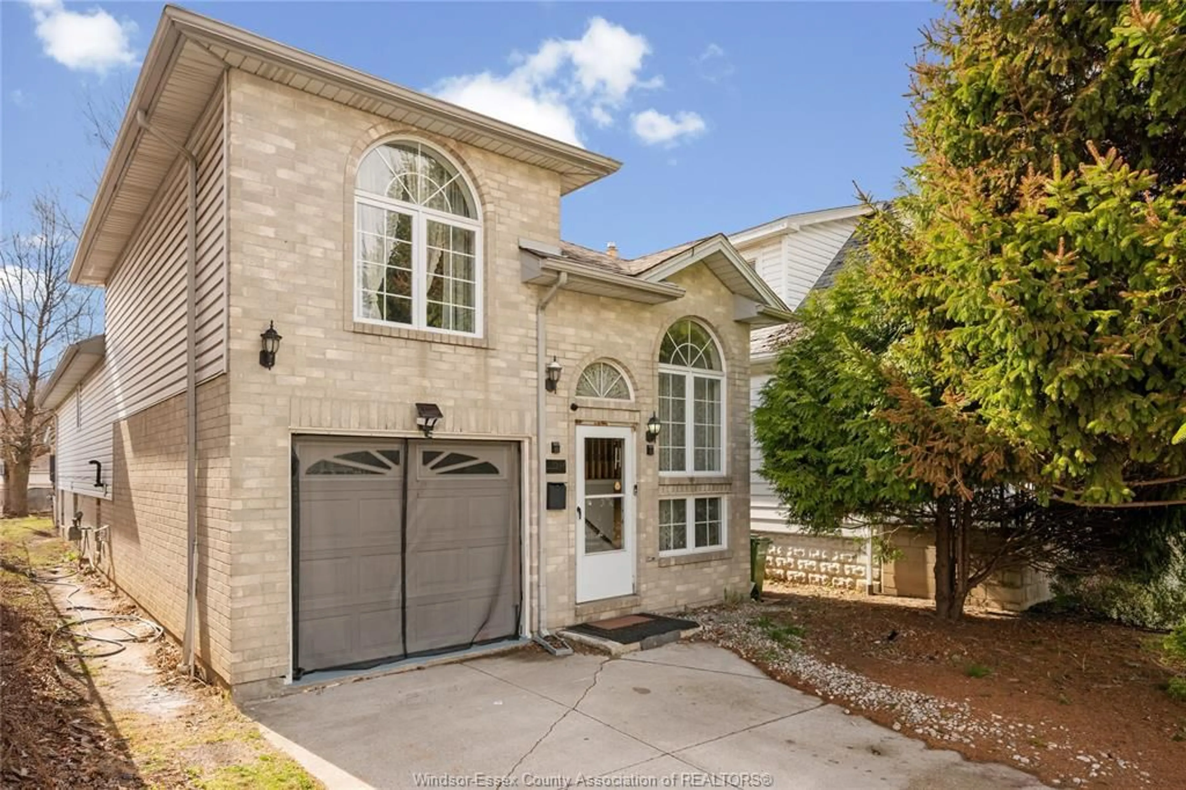 Home with brick exterior material, street for 1537 LANGLOIS Ave, Windsor Ontario N8X 4M3