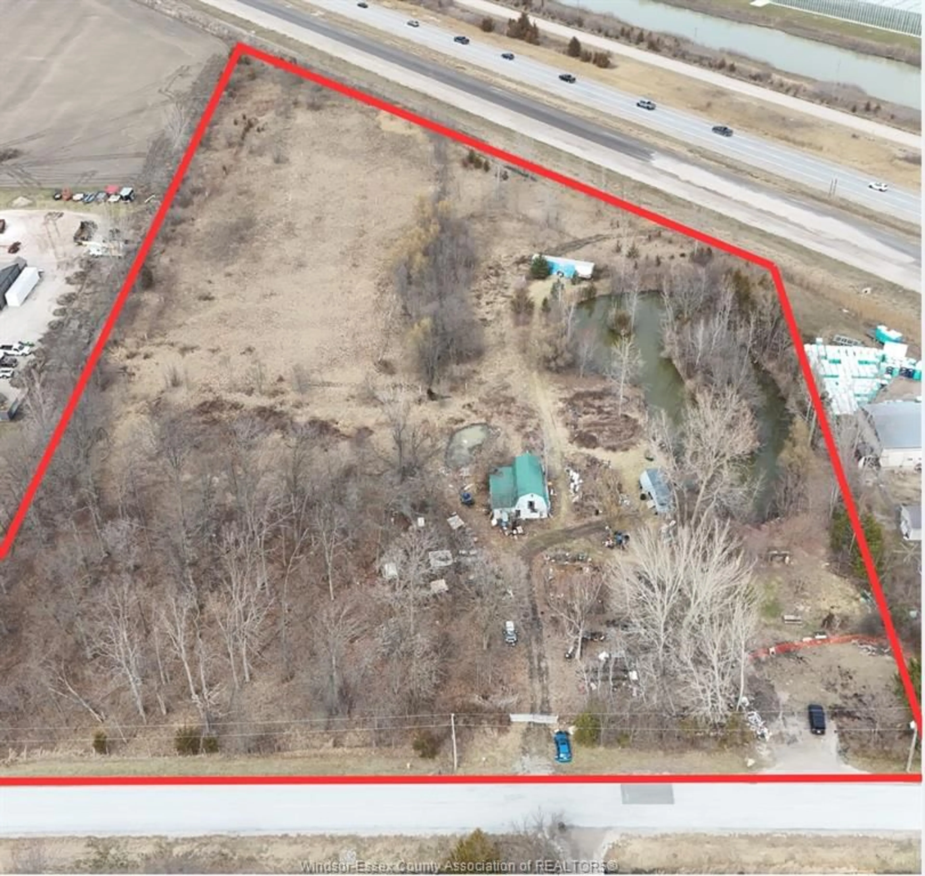 A pic from outside/outdoor area/front of a property/back of a property/a pic from drone, building for 100 ROAD 6, Kingsville Ontario N0R 1B0