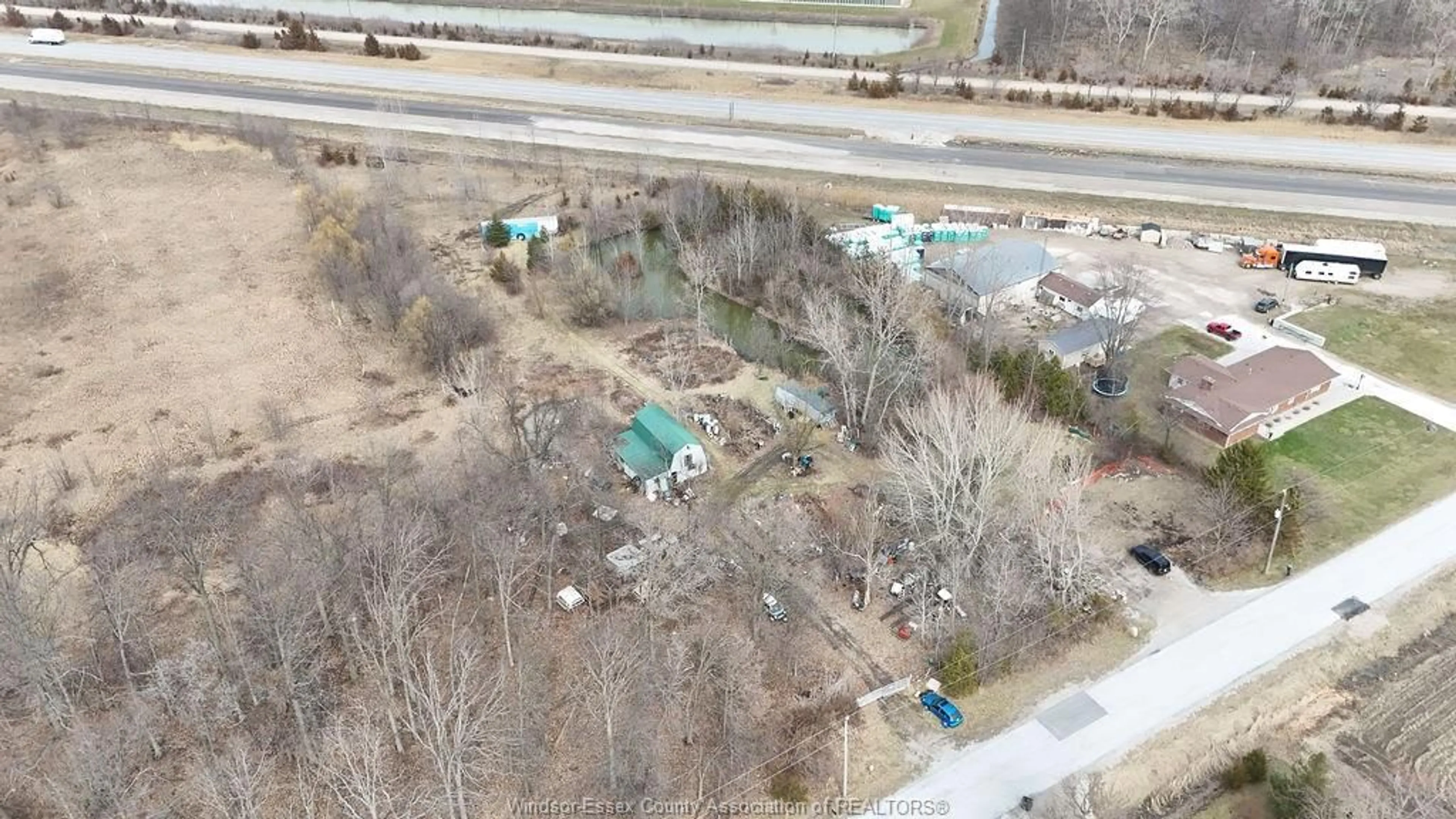 A pic from outside/outdoor area/front of a property/back of a property/a pic from drone, city buildings view from balcony for 100 ROAD 6, Kingsville Ontario N0R 1B0