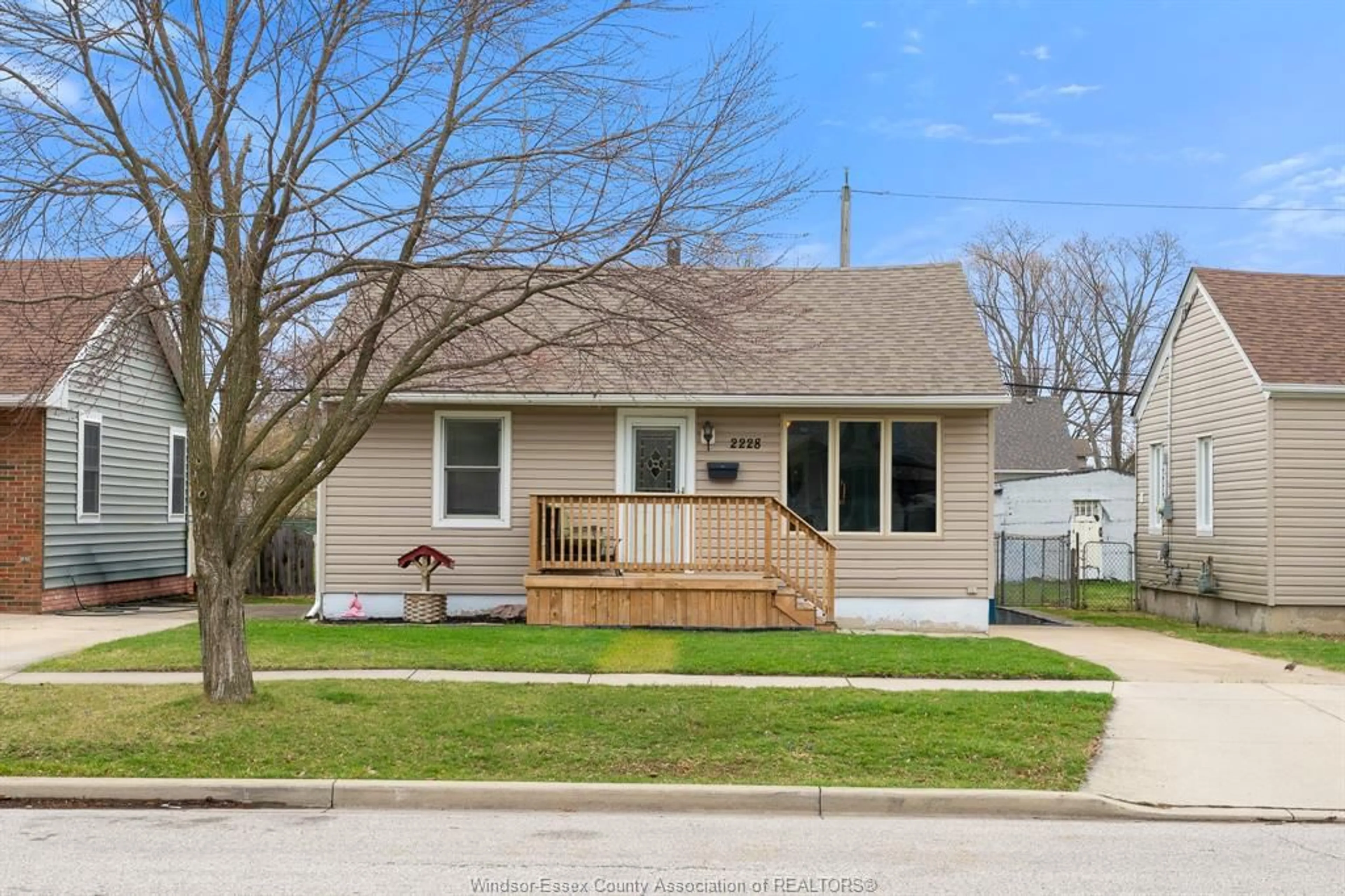 Home with vinyl exterior material, street for 2228 Elsmere Ave, Windsor Ontario N8W 2C6