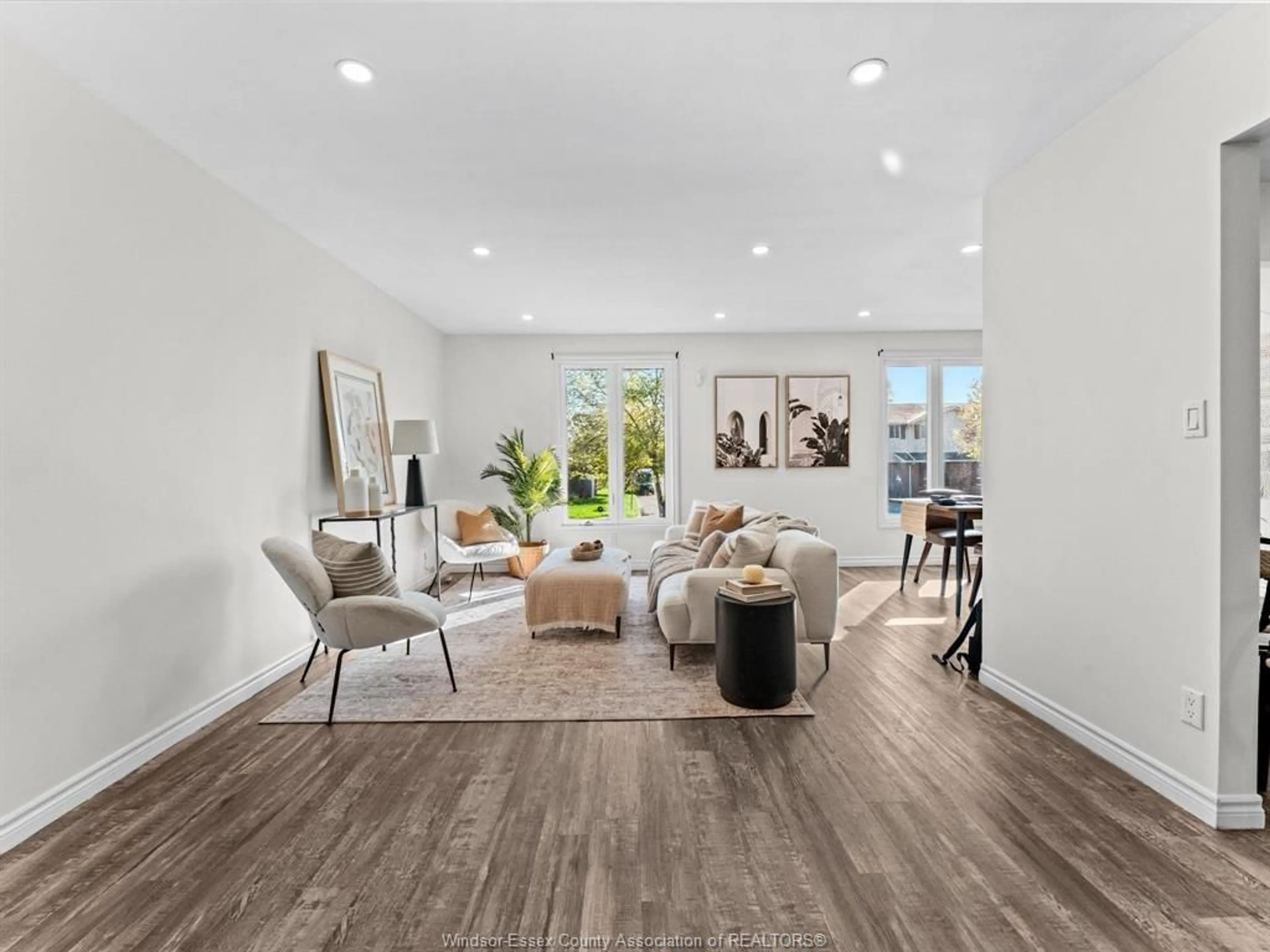 Living room with furniture, unknown for 3195 Conservation Dr, Windsor Ontario N8W 5B8