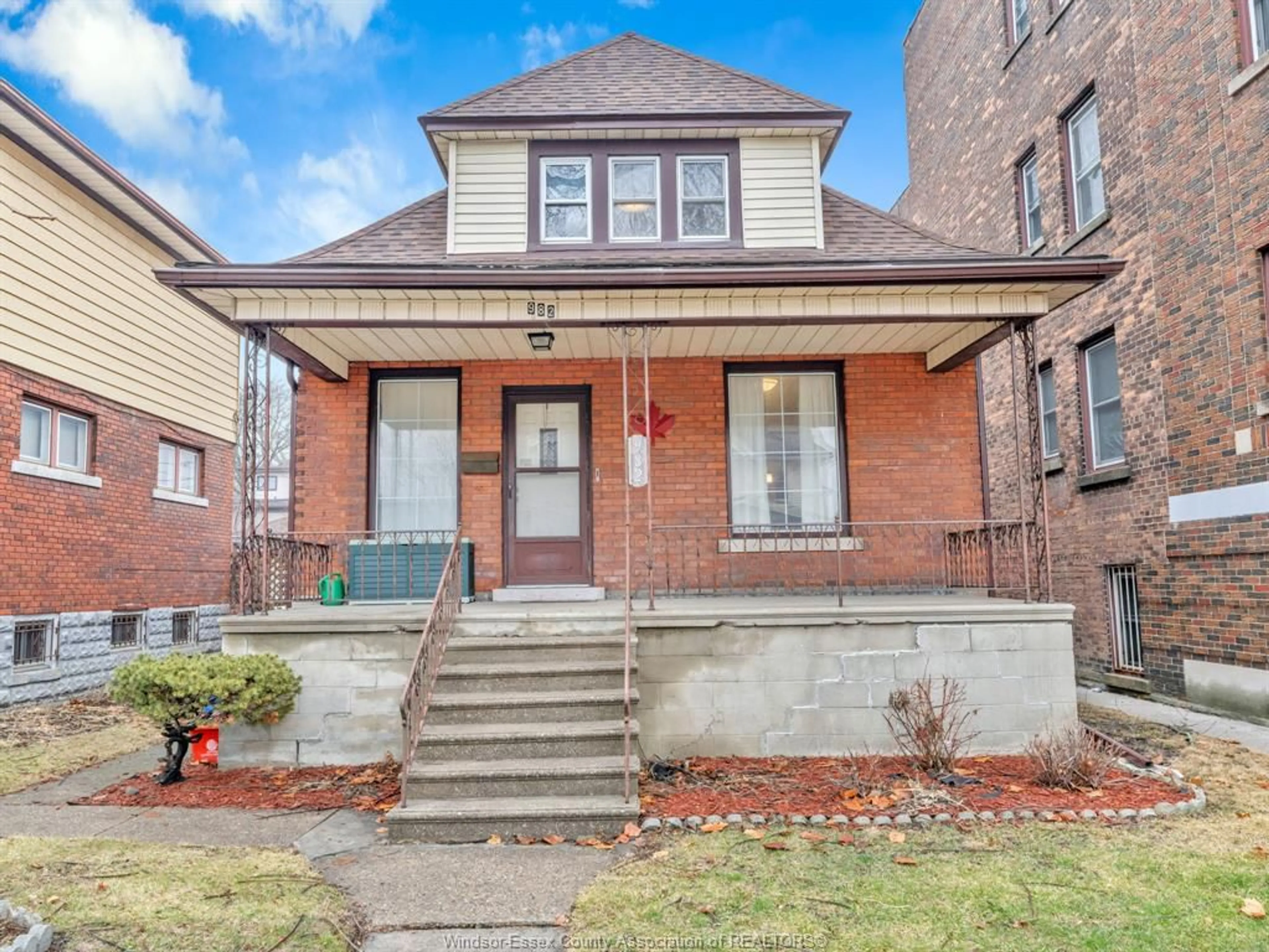 Home with brick exterior material, street for 982 DOUGALL Ave, Windsor Ontario N9A 4R1