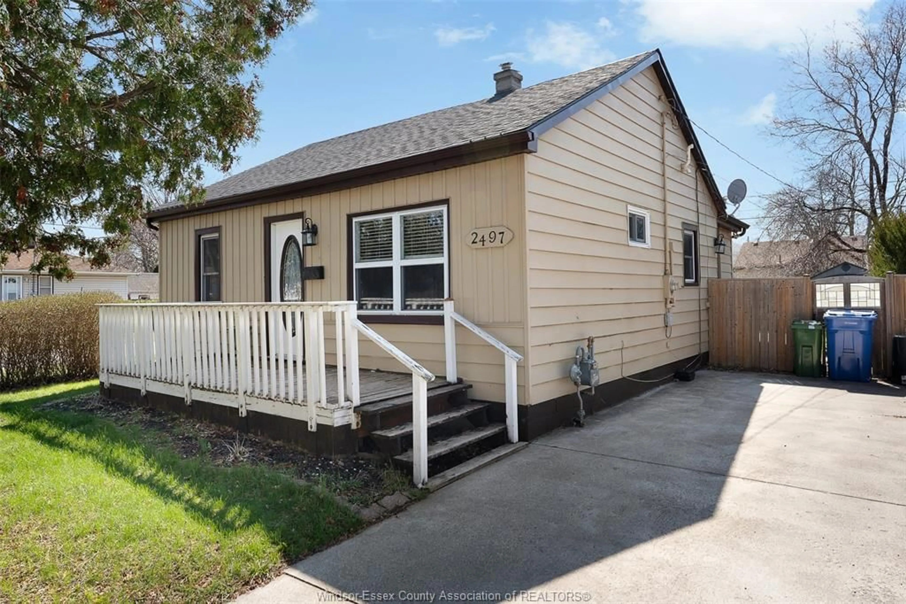 Home with vinyl exterior material, street for 2497 CHANDLER, Windsor Ontario N8W 4A7
