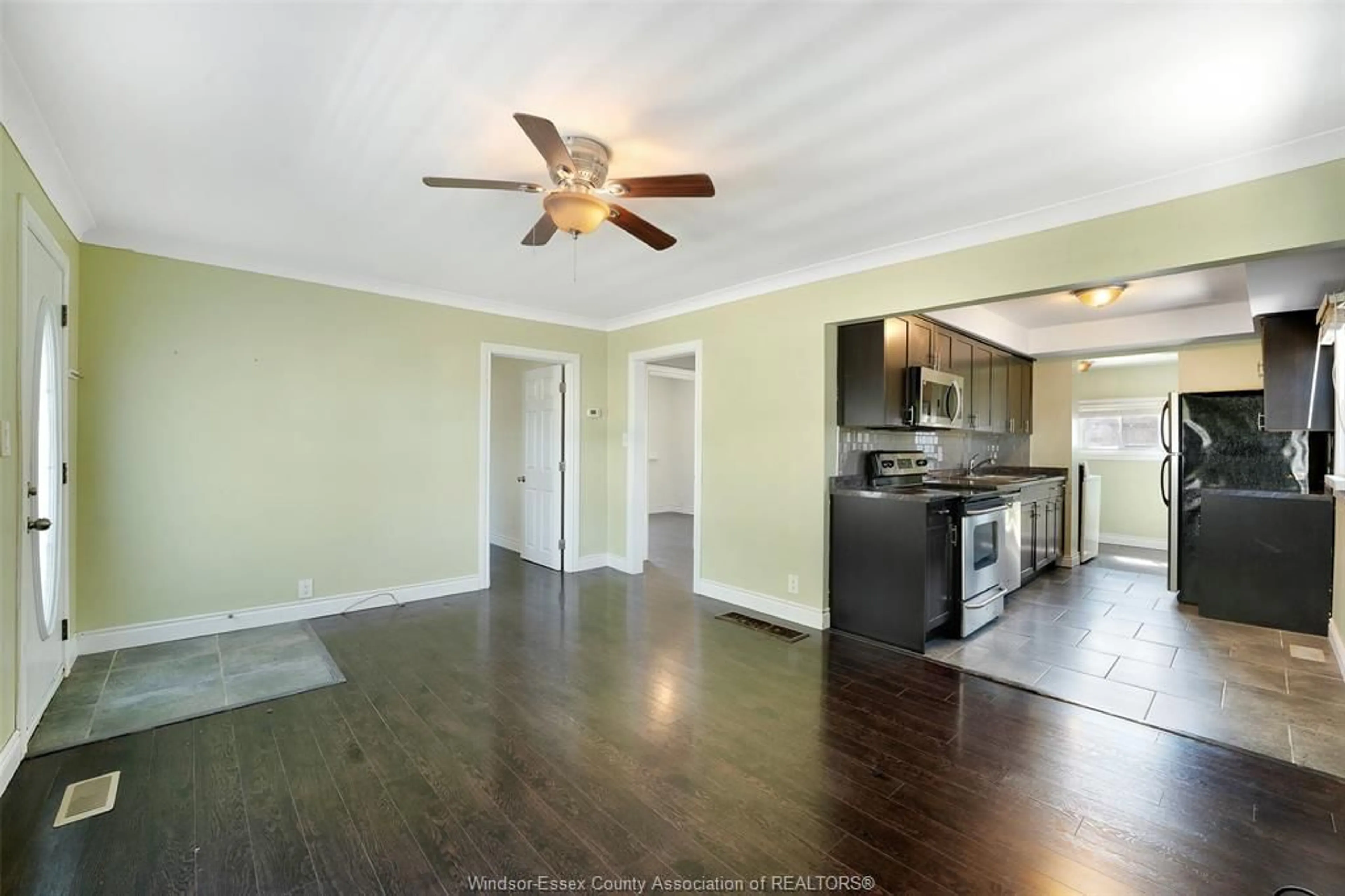 Open concept kitchen, wood/laminate floor for 2497 CHANDLER, Windsor Ontario N8W 4A7