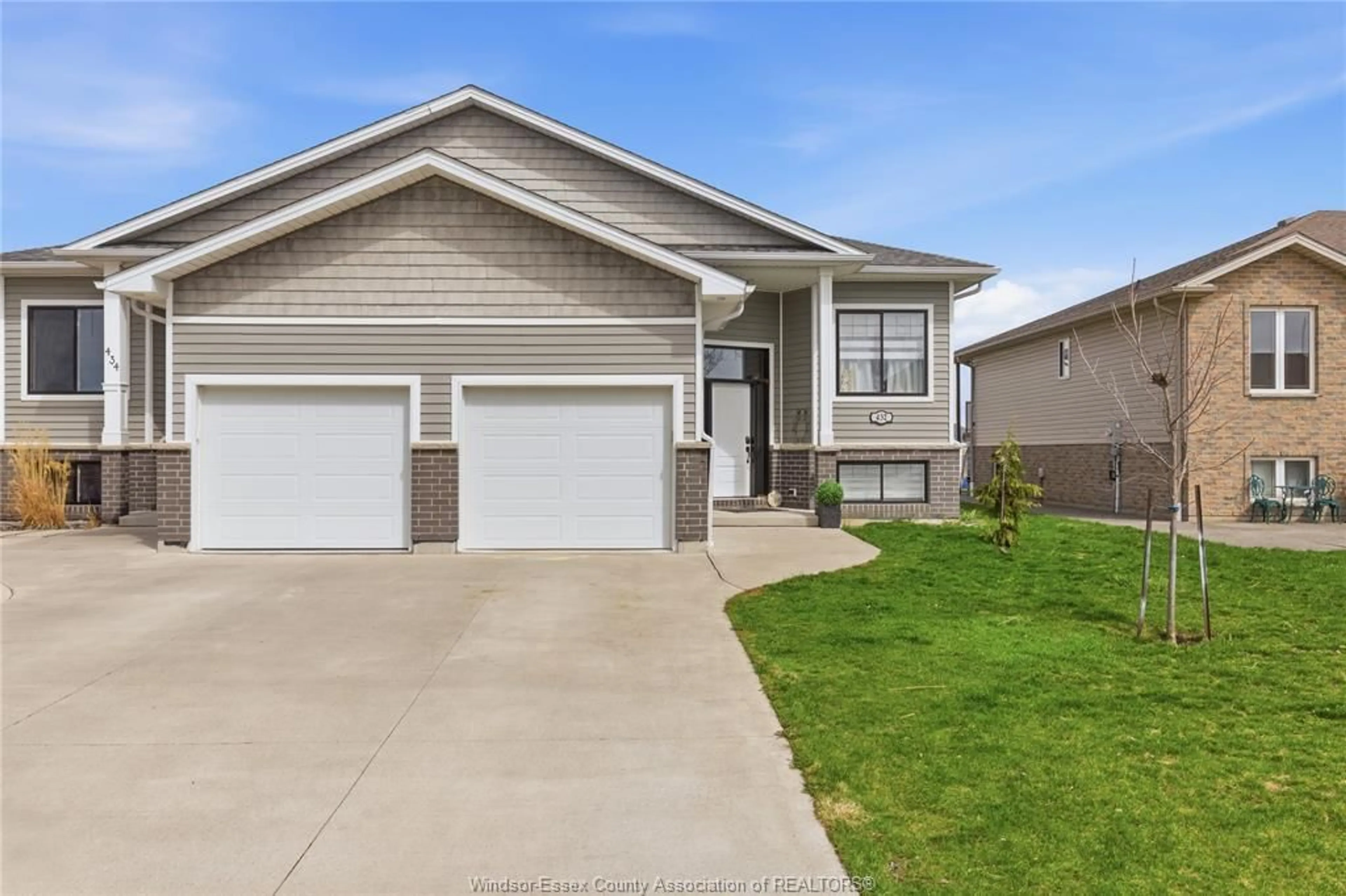 Home with vinyl exterior material, street for 432 ROSEWOOD Dr, Lakeshore Ontario N0R 1A7