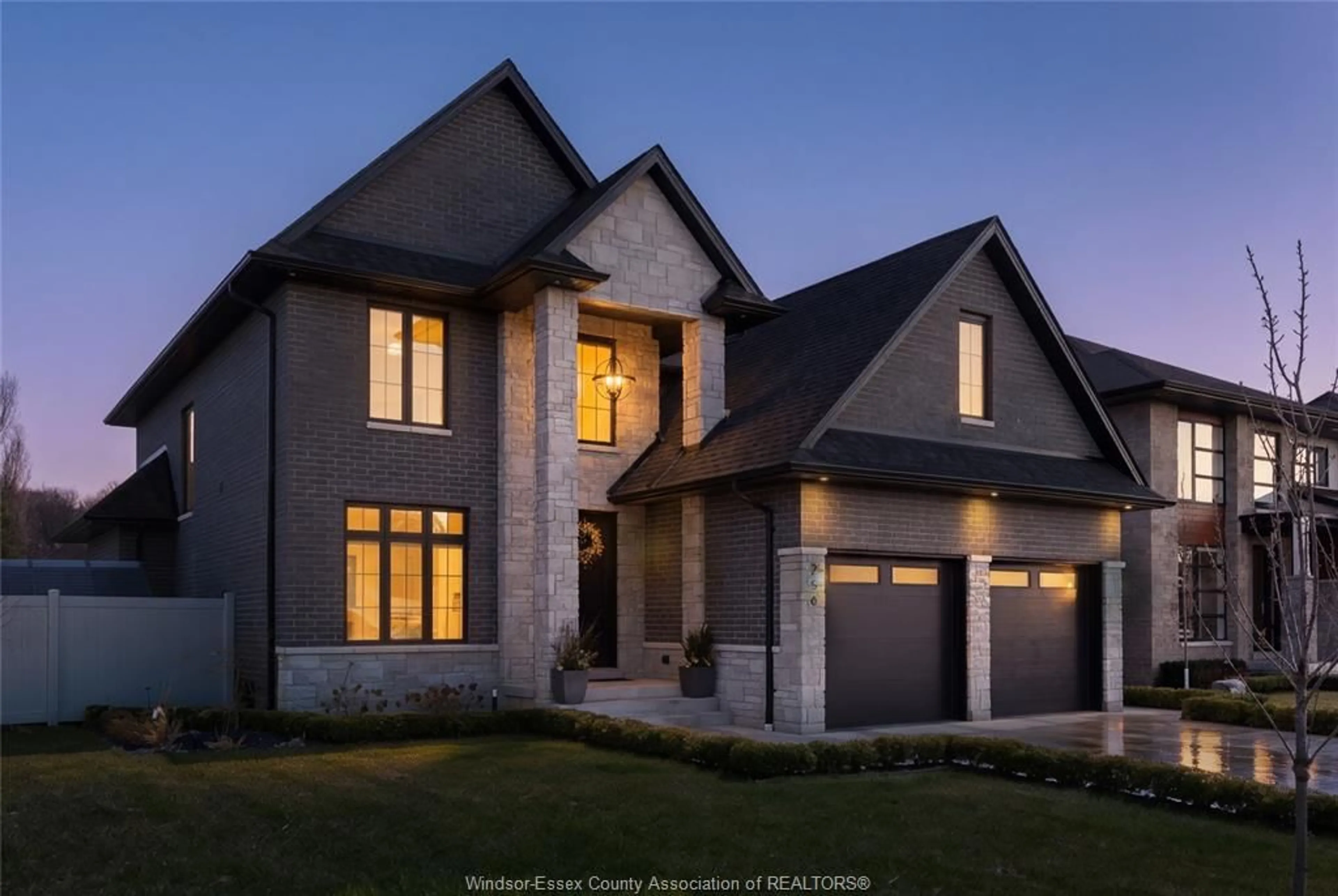 Home with brick exterior material, street for 256 XAVIER Cir, Lakeshore Ontario N0R 1A0