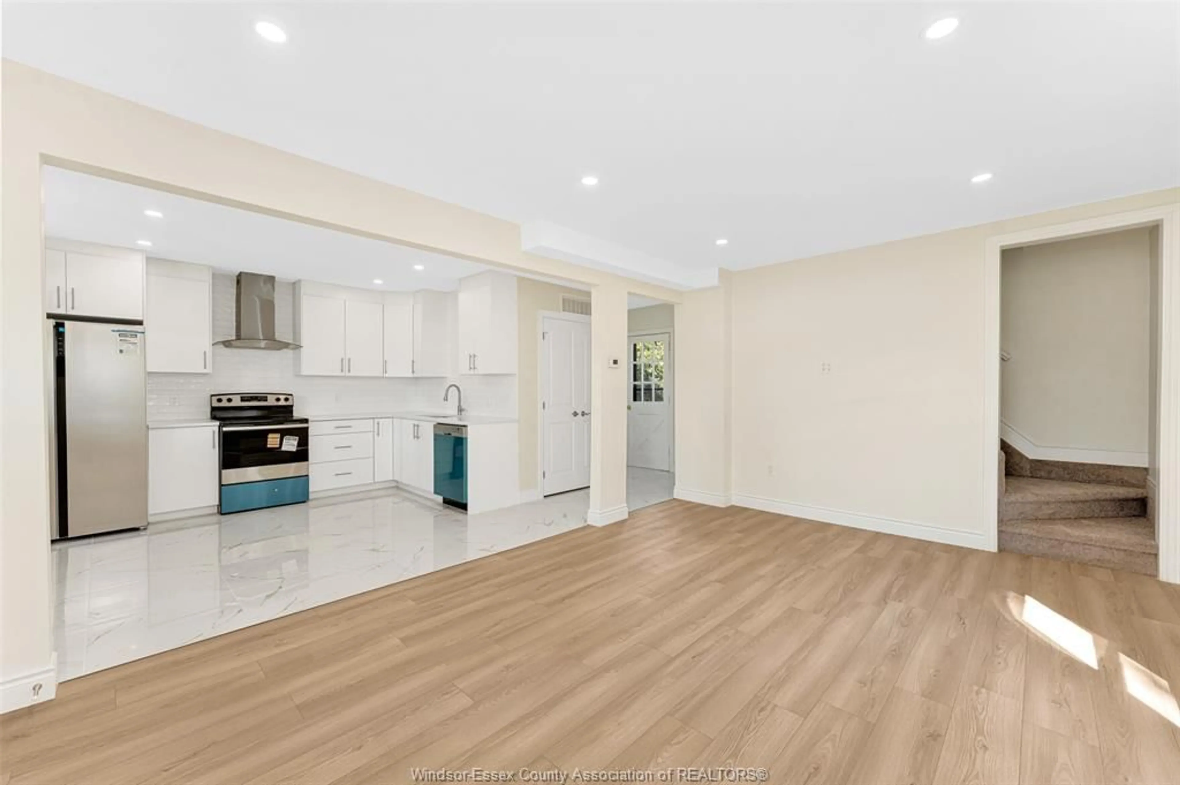 Open concept kitchen, wood/laminate floor for 1092 ST. LUKE, Windsor Ontario N8Y 3M8