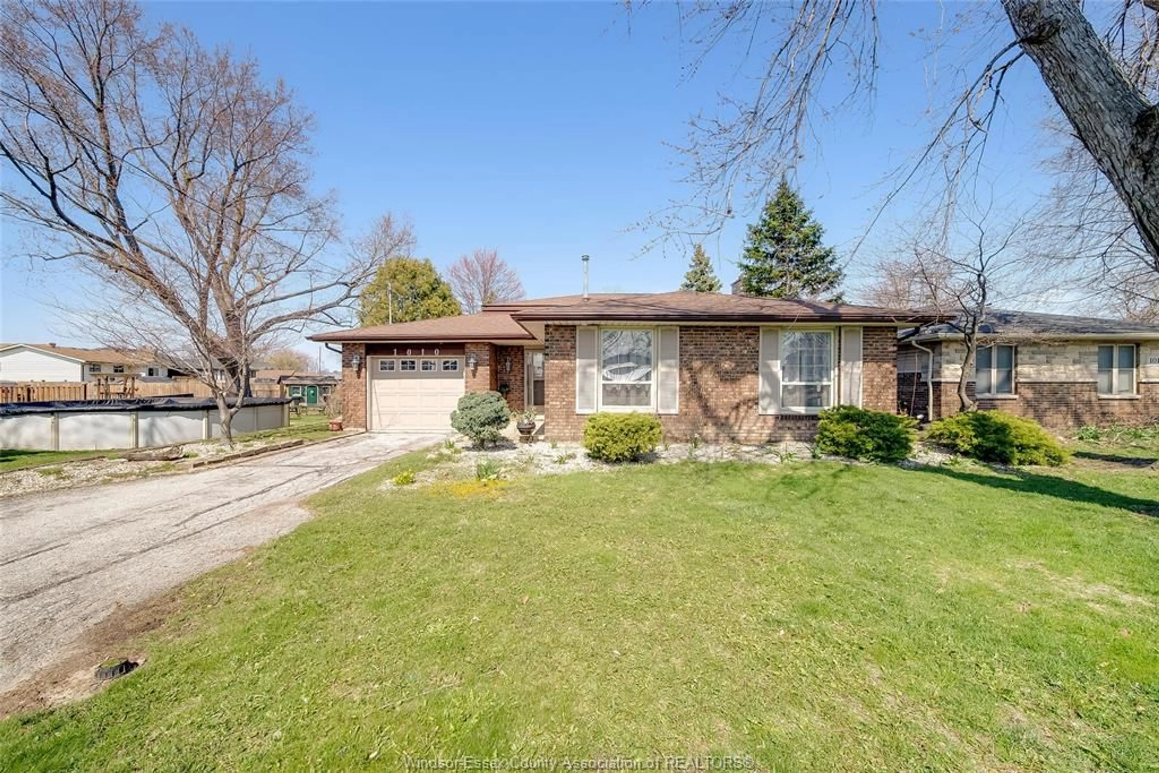 Home with brick exterior material, street for 1010 COUNTY Rd #22, Lakeshore Ontario N0R 1A0