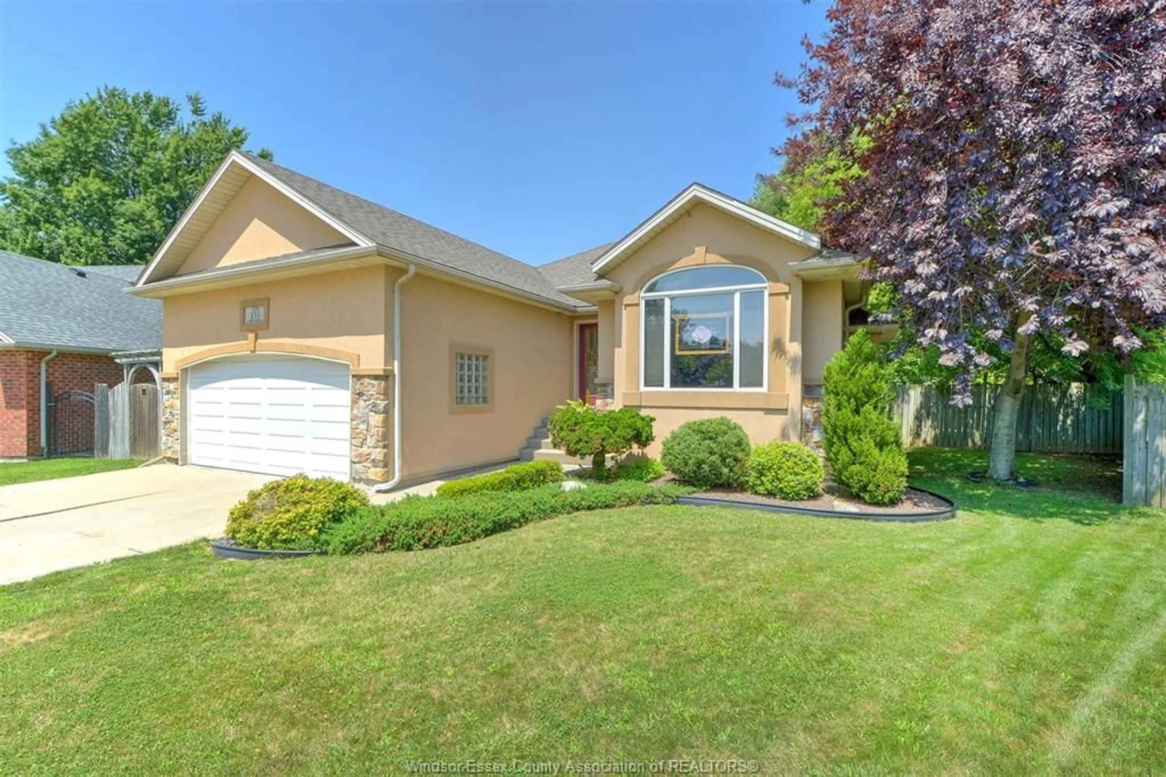 Home with vinyl exterior material, street for 153 PURPLE PLUM Dr, Kingsville Ontario N9Y 3P5