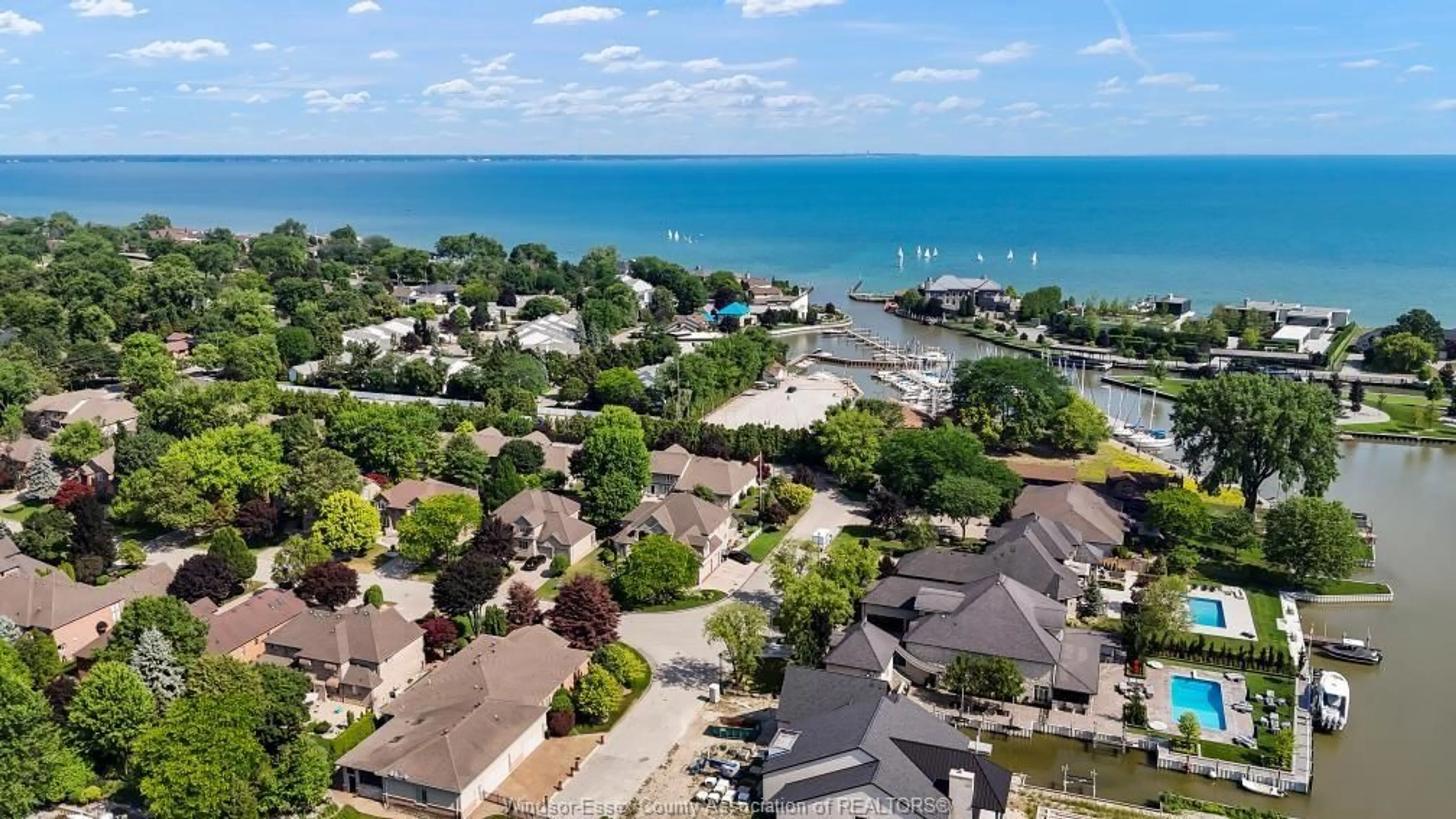 A pic from outside/outdoor area/front of a property/back of a property/a pic from drone, water/lake/river/ocean view for 235 SOUTHWIND, Tecumseh Ontario N8N 4Y5