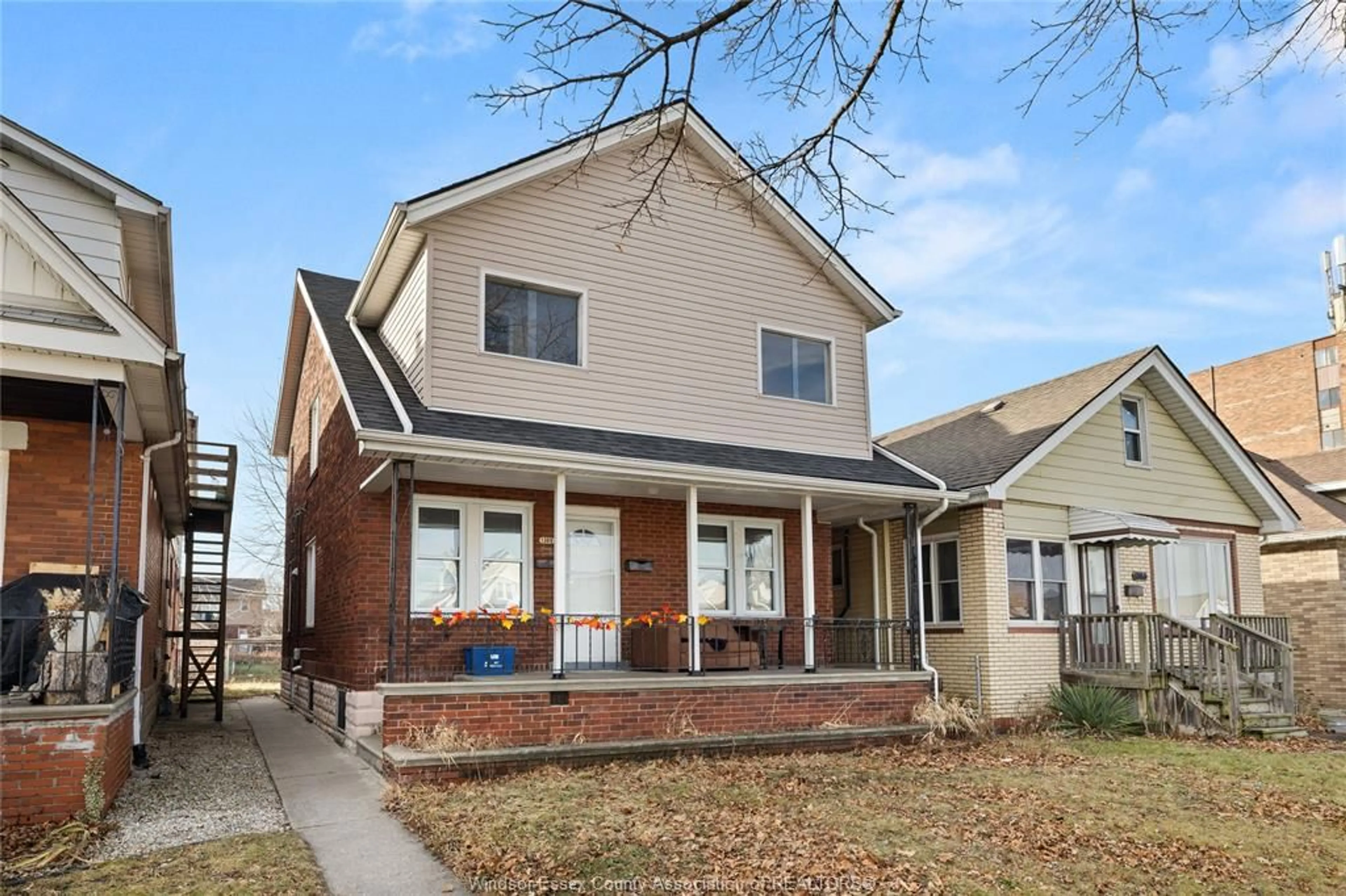 Home with brick exterior material, street for 1389 LANGLOIS Ave, Windsor Ontario N8X 4L8