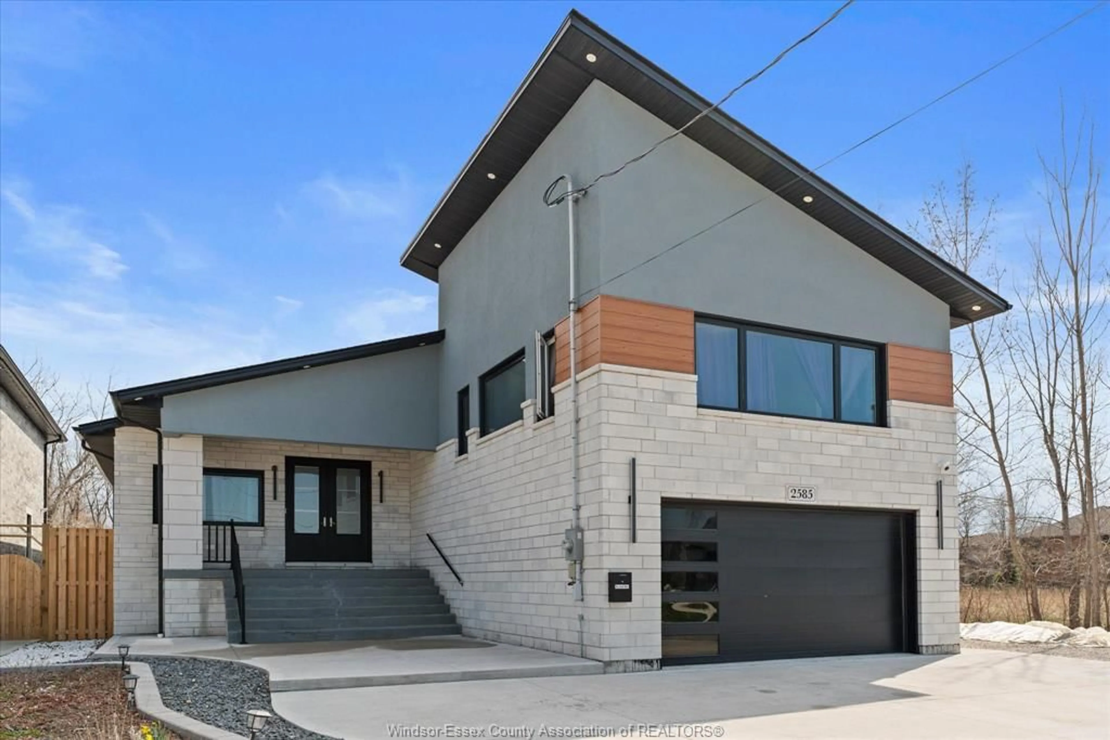 Home with brick exterior material, street for 2585 KENORA St, Windsor Ontario N9B 1Y3