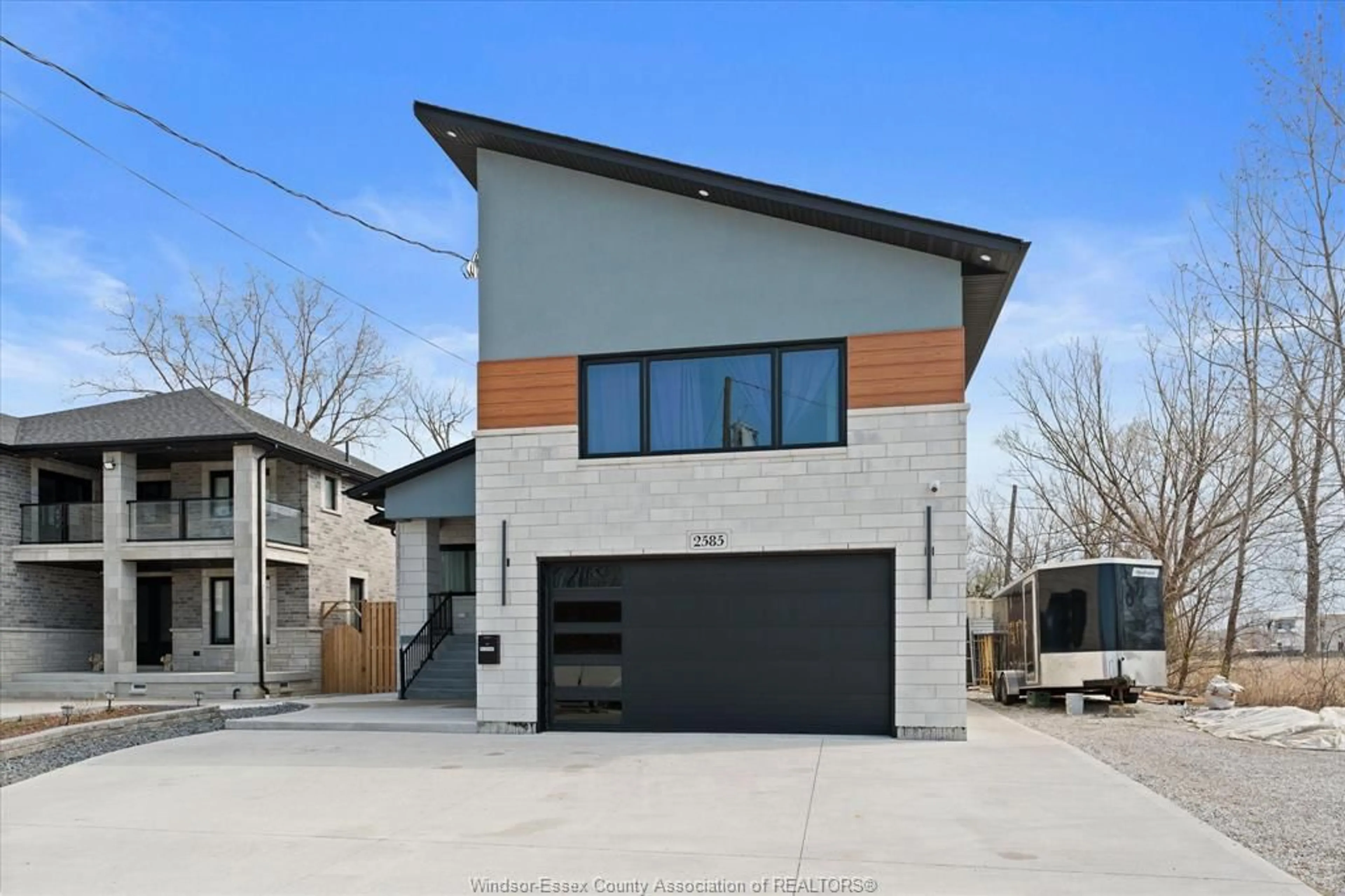 Home with brick exterior material, street for 2585 KENORA St, Windsor Ontario N9B 1Y3