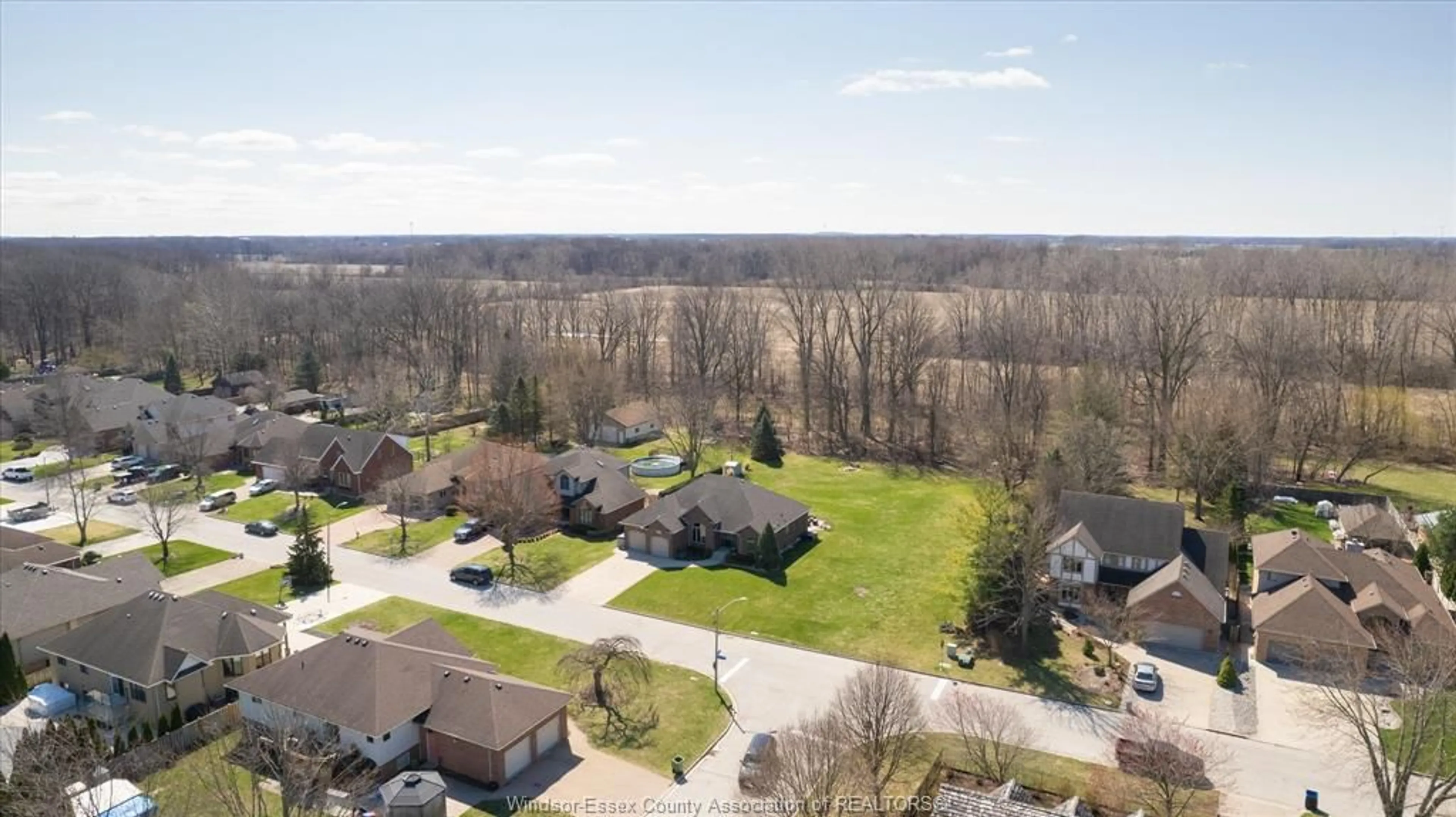 A pic from outside/outdoor area/front of a property/back of a property/a pic from drone, water/lake/river/ocean view for 2105 SUZANNE, LaSalle Ontario N9H 2K3